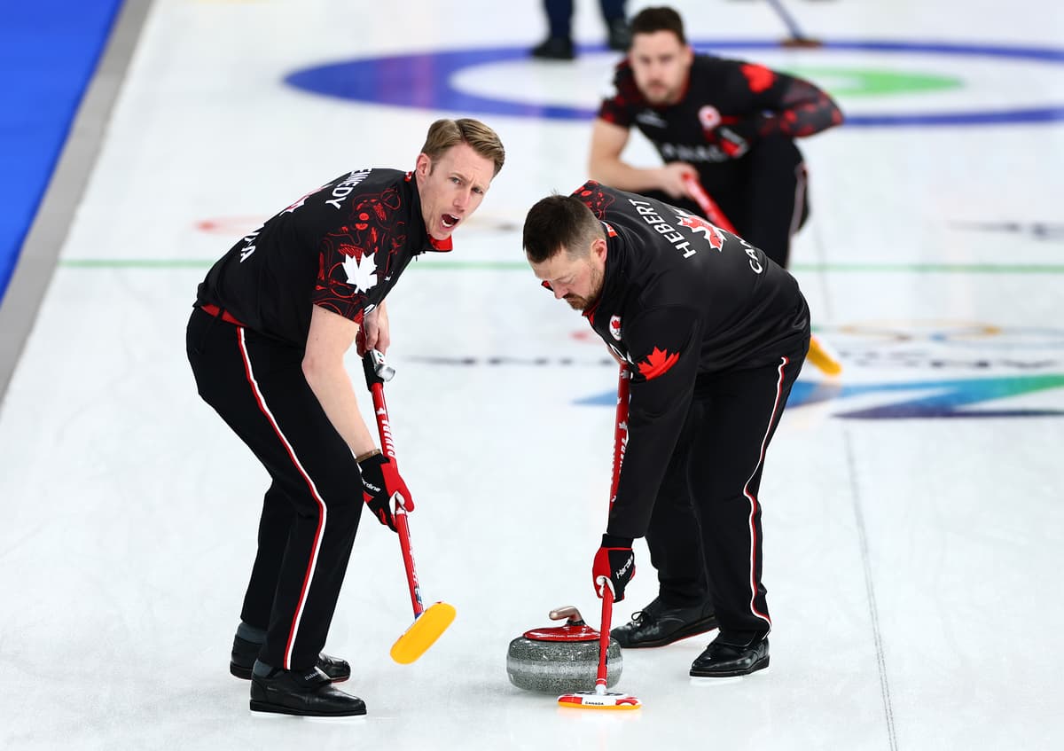 Mattia Ozbot/Getty Images Marc Kennedy of Team Canada (left) competes in curling against Team United States during the 2026 Winter Olympics at Cortina d'Ampezzo, Italy, on February 13, 2026.