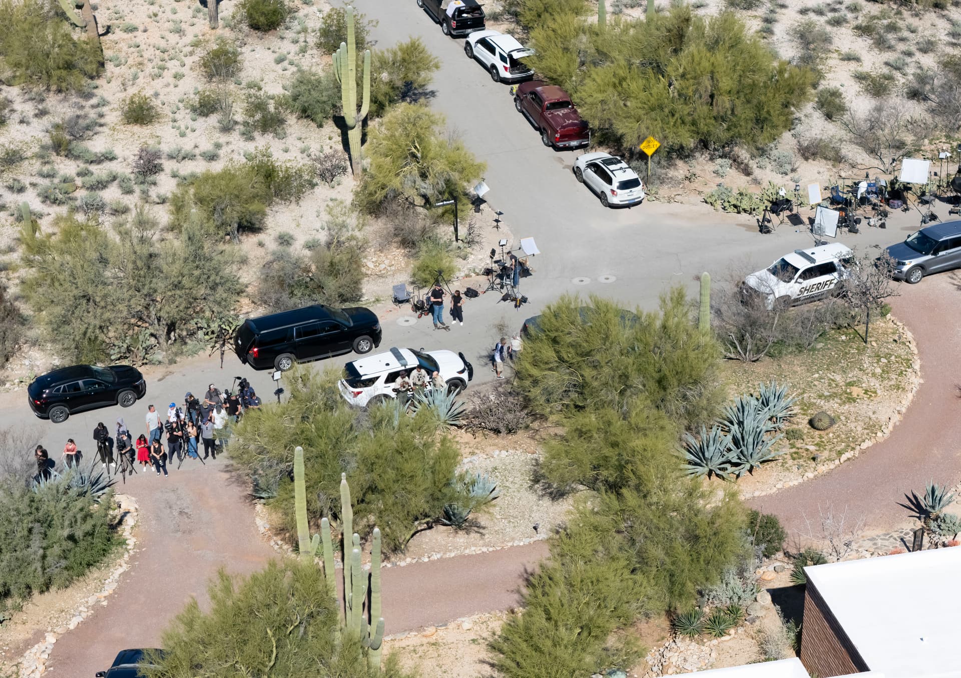 Rebecca Noble/Getty Images In an aerial view, media are stationed outside the home of Nancy Guthrie as authorities continue to investigate on February 8, 2026 in Tucson, Arizona.