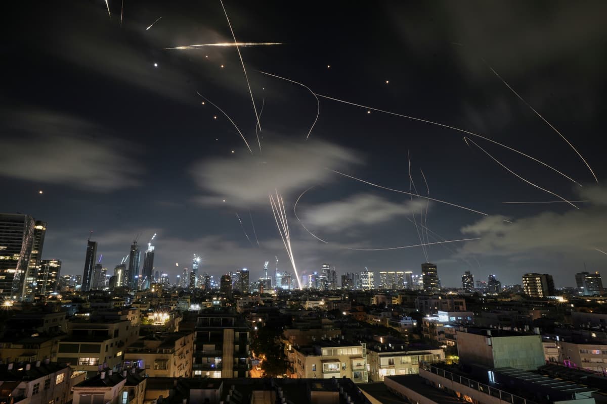 Leo Correa/AP The Israeli Iron Dome air defense system intercepts missiles during an Iranian attack at Tel Aviv, Israel, on June 18, 2025.