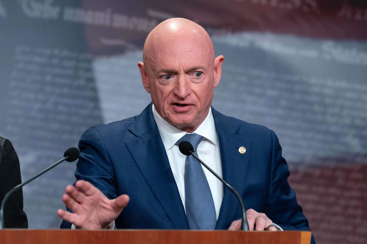 Jose Luis Magana/AP Senator Mark Kelly speaks during a news conference at Capitol Hill on February 11, 2026.