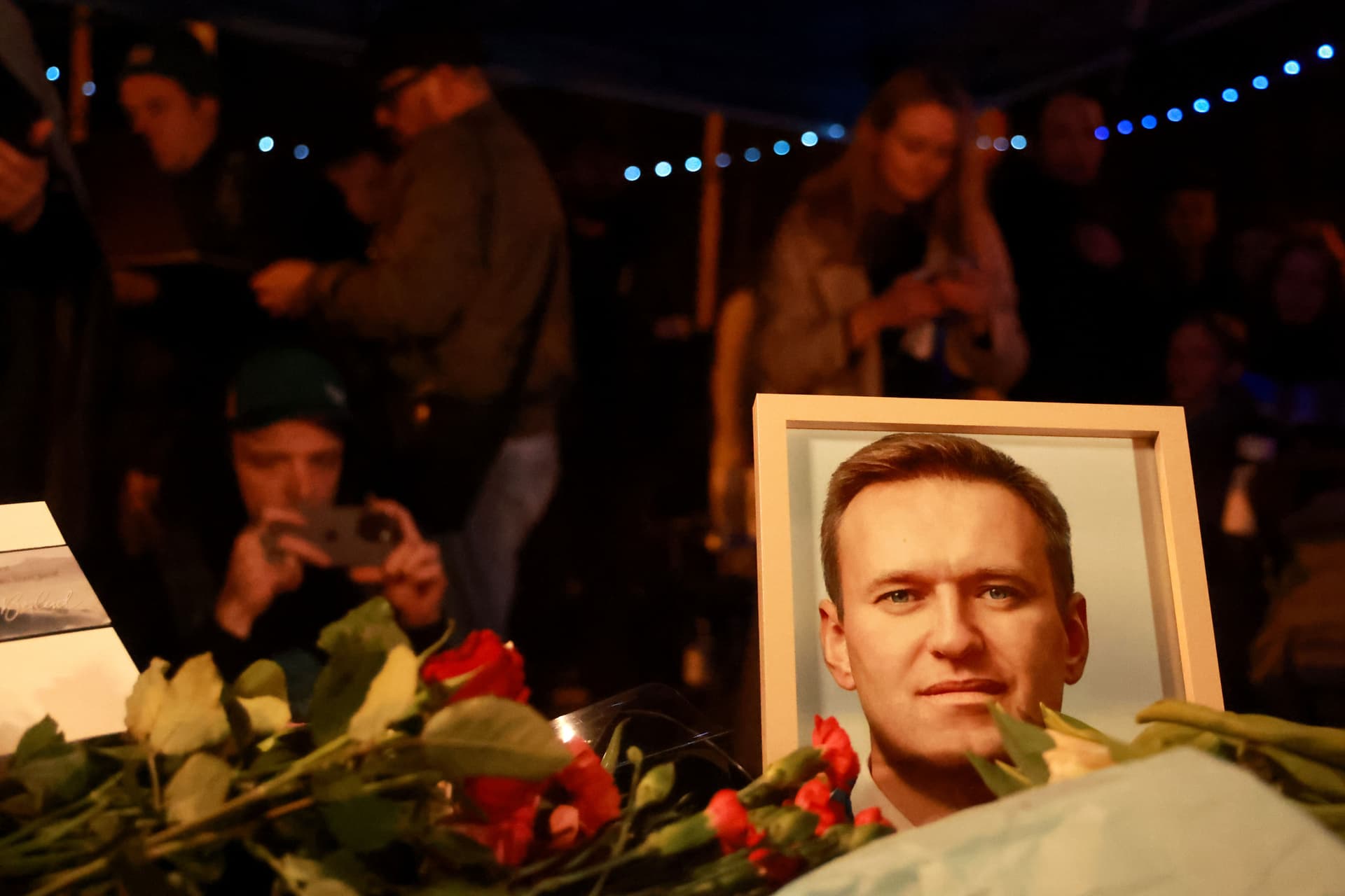 Johannes Simon/Getty Images Supporters leave flowers during a vigil for Alexei Navalny in front of the Russian consulate general at Munich, Germany, hours after his death on February 16, 2024.