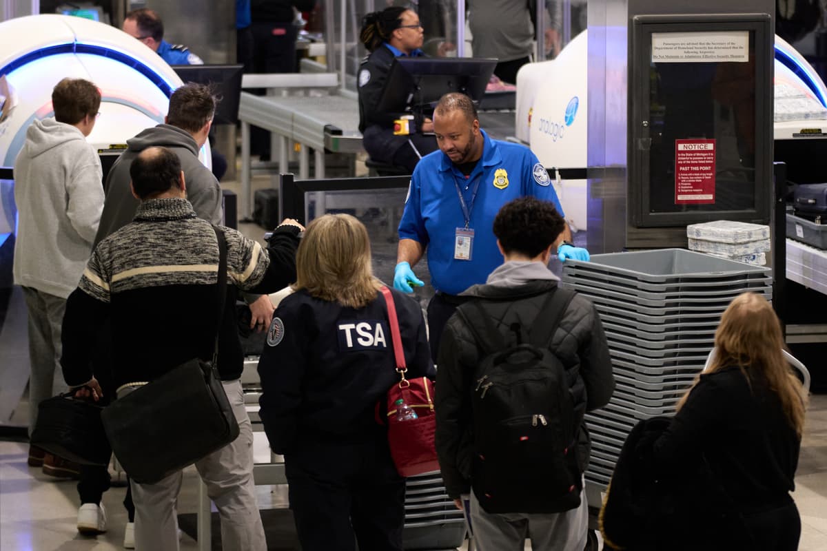 Ryan Sun/AP Travelers wait at a TSA security checkpoint at Detroit, Michigan, on November 30, 2025.