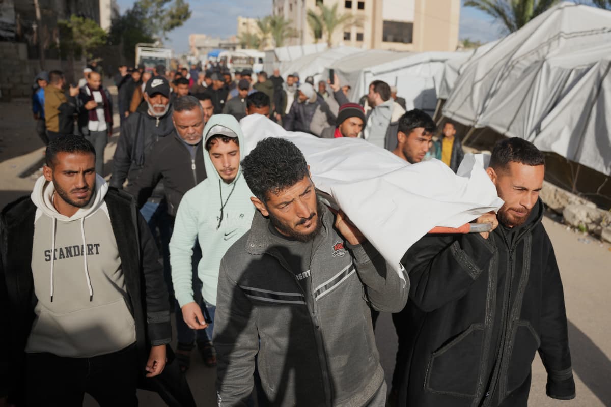 AP/Abdel Kareem Hana Palestinians carry the body of a man who was killed in an Israeli military strike, during his funeral at Nasser Hospital at Khan Younis, February 4, 2026.