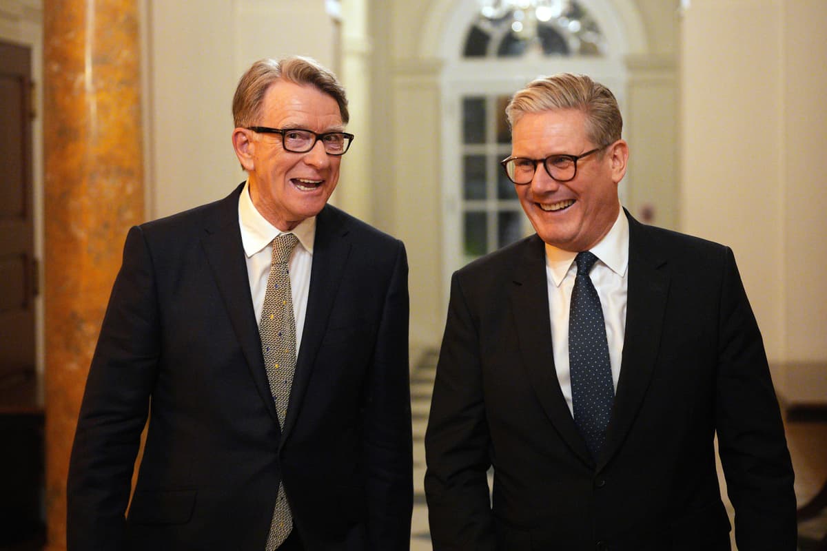 Carl Court/Pool Photo via AP Britain's prime minister, Keir Starmer, right, talks with Britain's ambassador to the United States, Peter Mandelson, during a welcome reception at the ambassador's residence in 2025 in Washington.