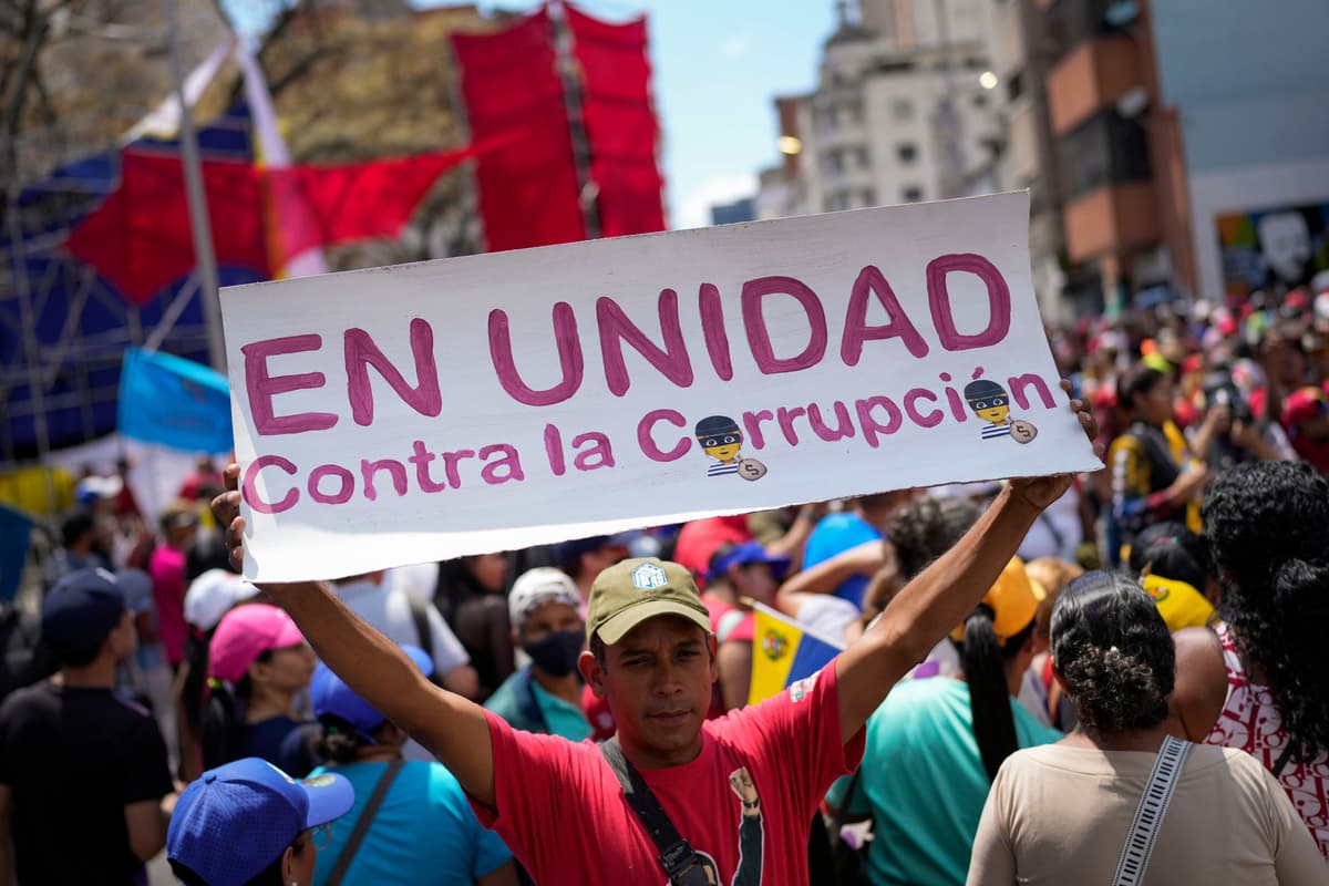 AP/Matias Delacroix A government supporter rallies against corruption in Venezuela, which sits near the bottom of the annual list.