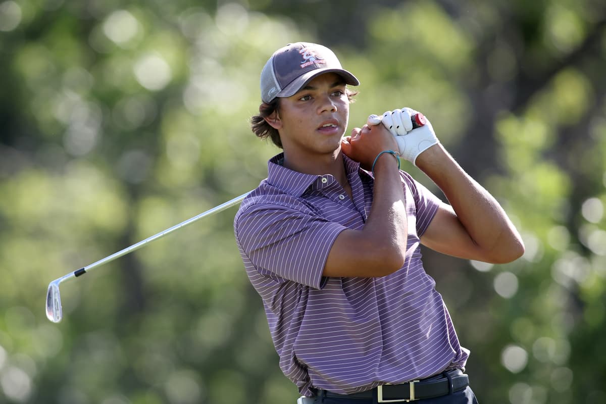 Tim Heitman/Getty Images Charlie Woods hits a tee shot during the U.S. Junior Amateur at Brook Hollow Golf Club at Dallas, Texas, on July 21, 2025.
