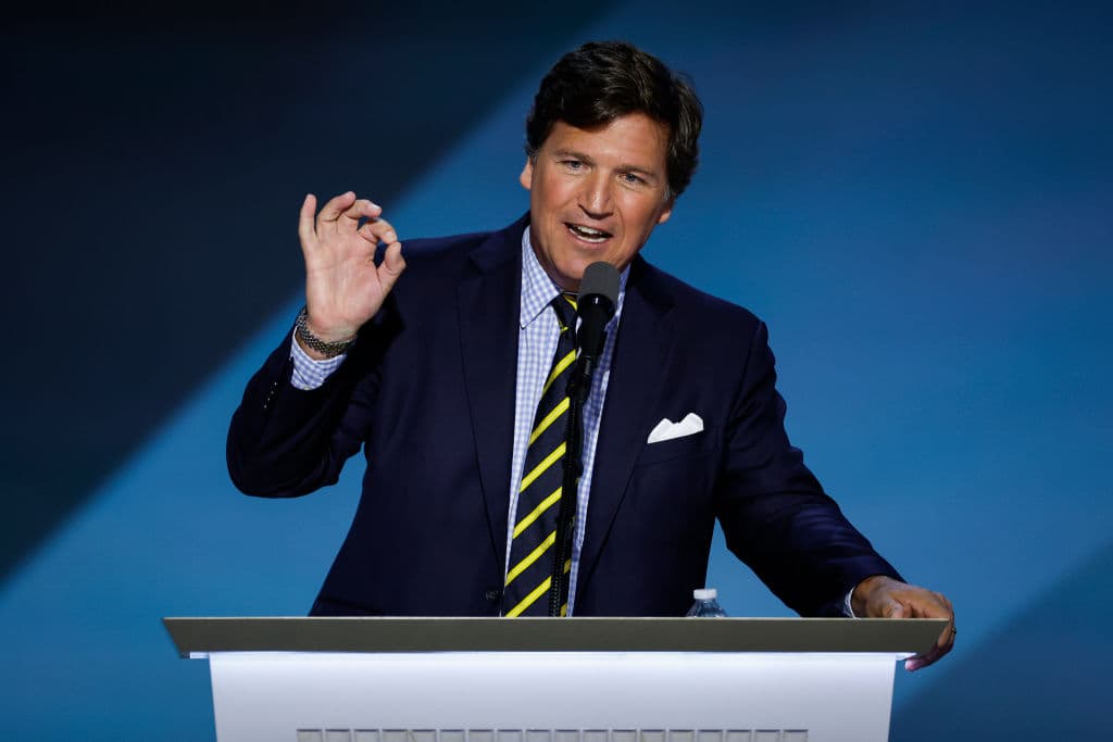Chip Somodevilla/Getty Images Tucker Carlson speaks on stage on the fourth day of the Republican National Convention at the Fiserv Forum on July 18, 2024 at Milwaukee.