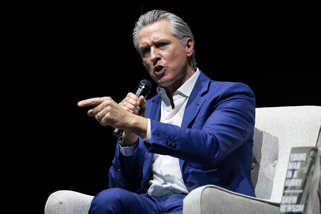 Benjamin Fanjoy/Getty Images Governor Gavin Newsom says some Democrats running for governor should consider quitting the race in the coming weeks.