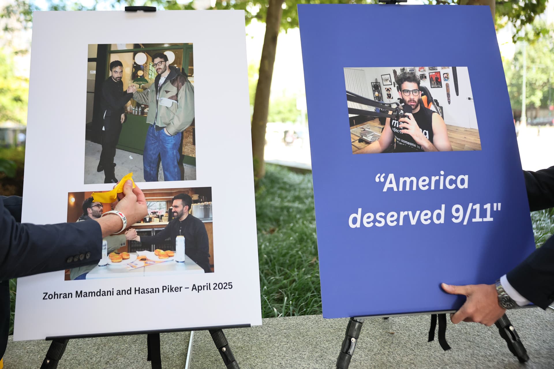 Michael M. Santiago/Getty Images Staffers put up poster boards of the then mayoral candidate, Zohran Mamdani, and influencer Hasan Piker before a press conference with the former New York governor, Andrew Cuomo, at New York City on September 9, 2025.