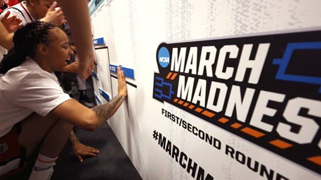 NCAA via Instagram
A North Carolina State player celebrates a victory in the NCAA tournament by placing the team’s name on a giant bracket at Raleigh, North Carolina, on March 25, 2024.