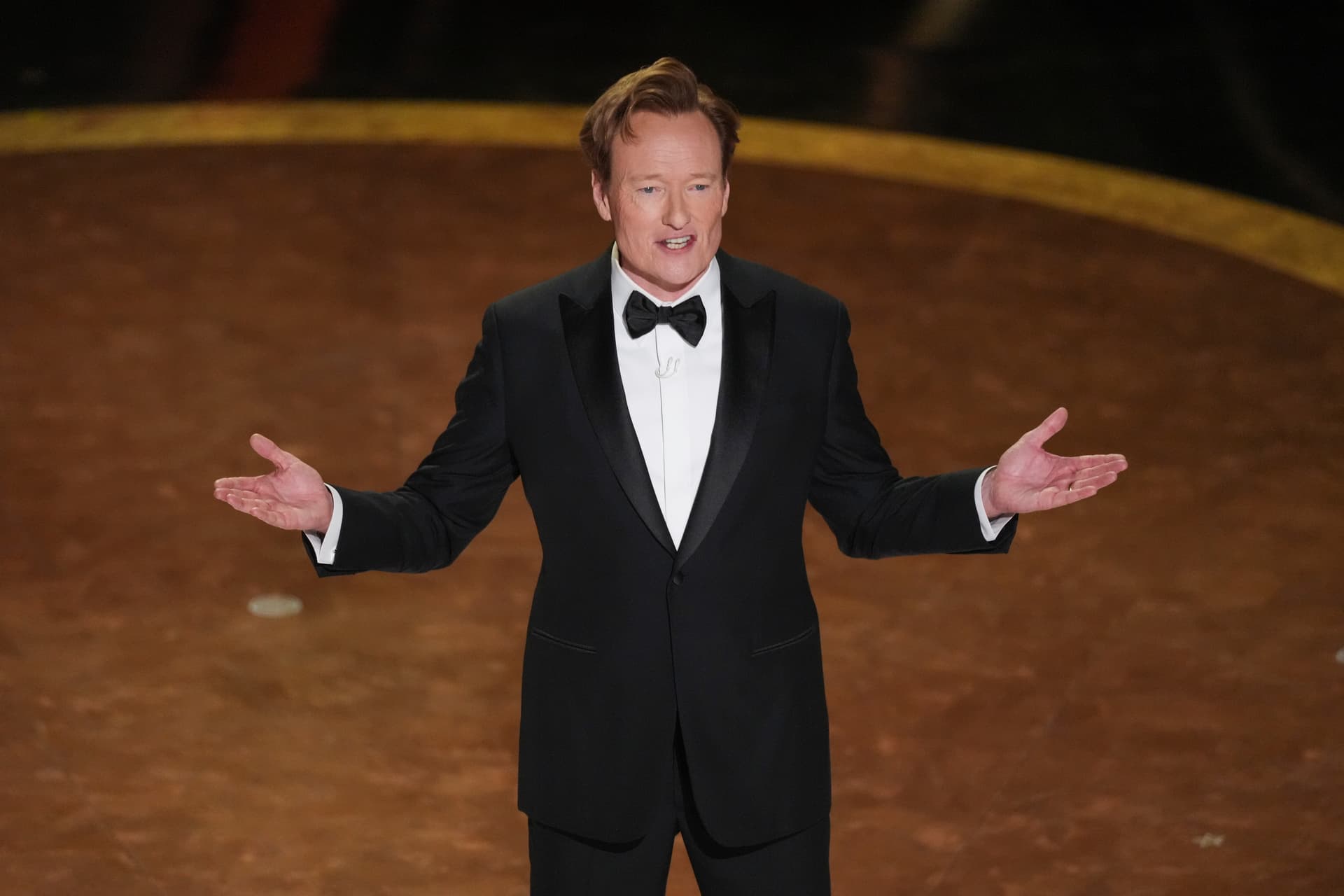 Chris Pizzello/AP Host Conan O'Brien speaks during the Oscars at Los Angeles on March 2, 2025.