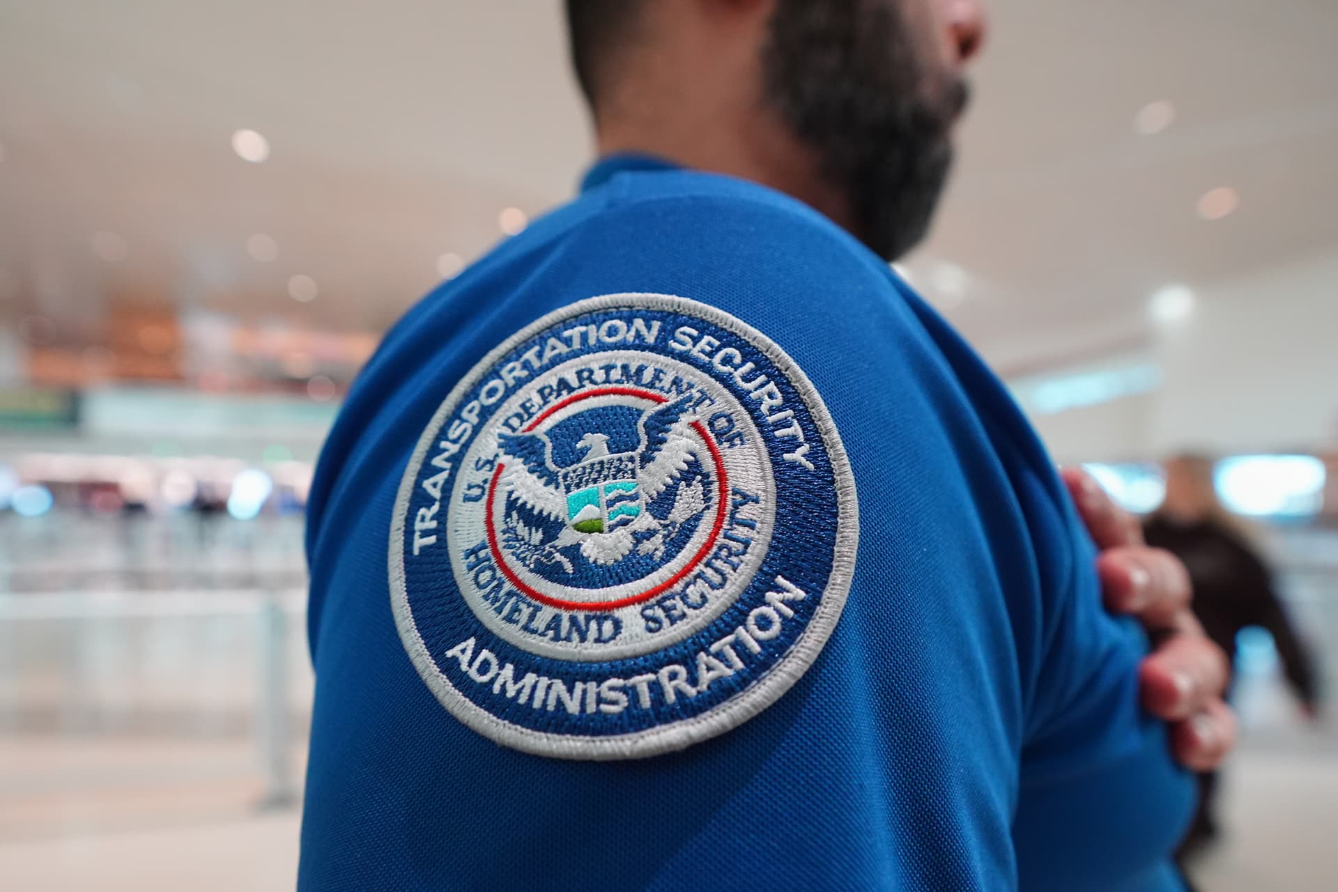 AP/LM Otero) A TSA agent at Love Field Airport, in Dallas, February 18, 2026.