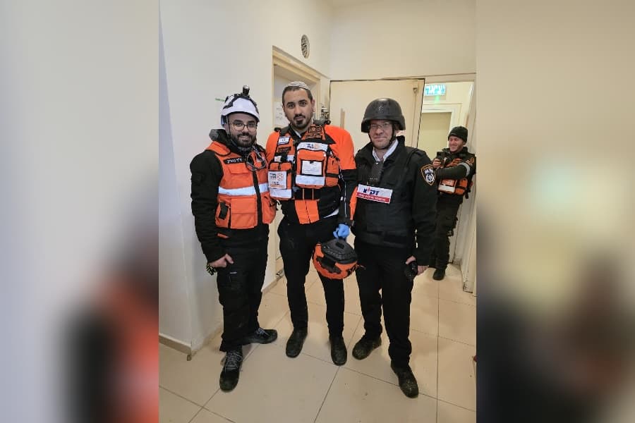 Courtesy of Dr. Tarek Abu Arar Dr. Tarek Abu Arar (left) with other emergency first responders from Zaka and Hatzalah.