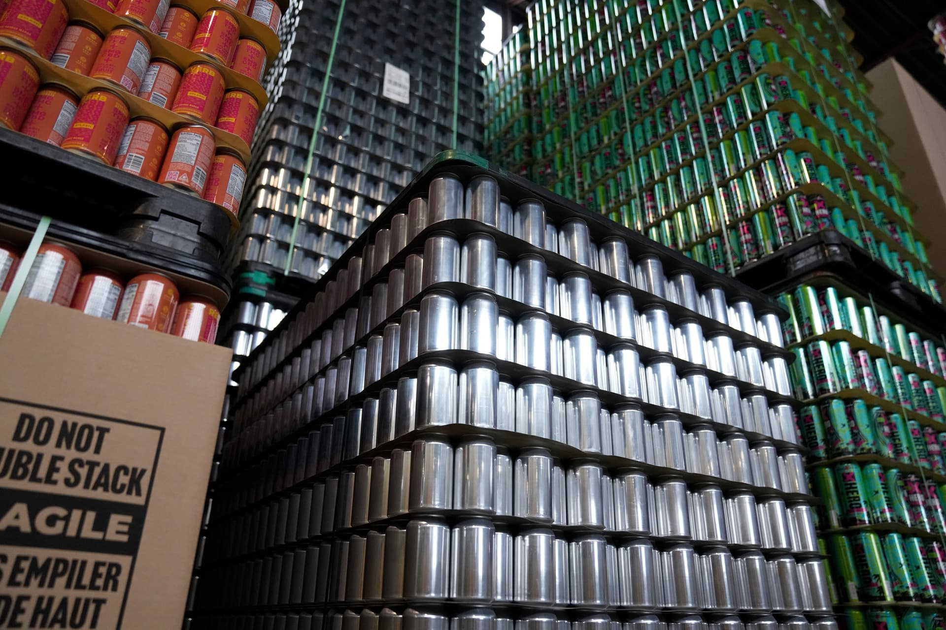 AP/Erin Hooley Empty aluminum cans are stacked at Revolution Brewing, Friday, Feb. 20, 2026, in Chicago.