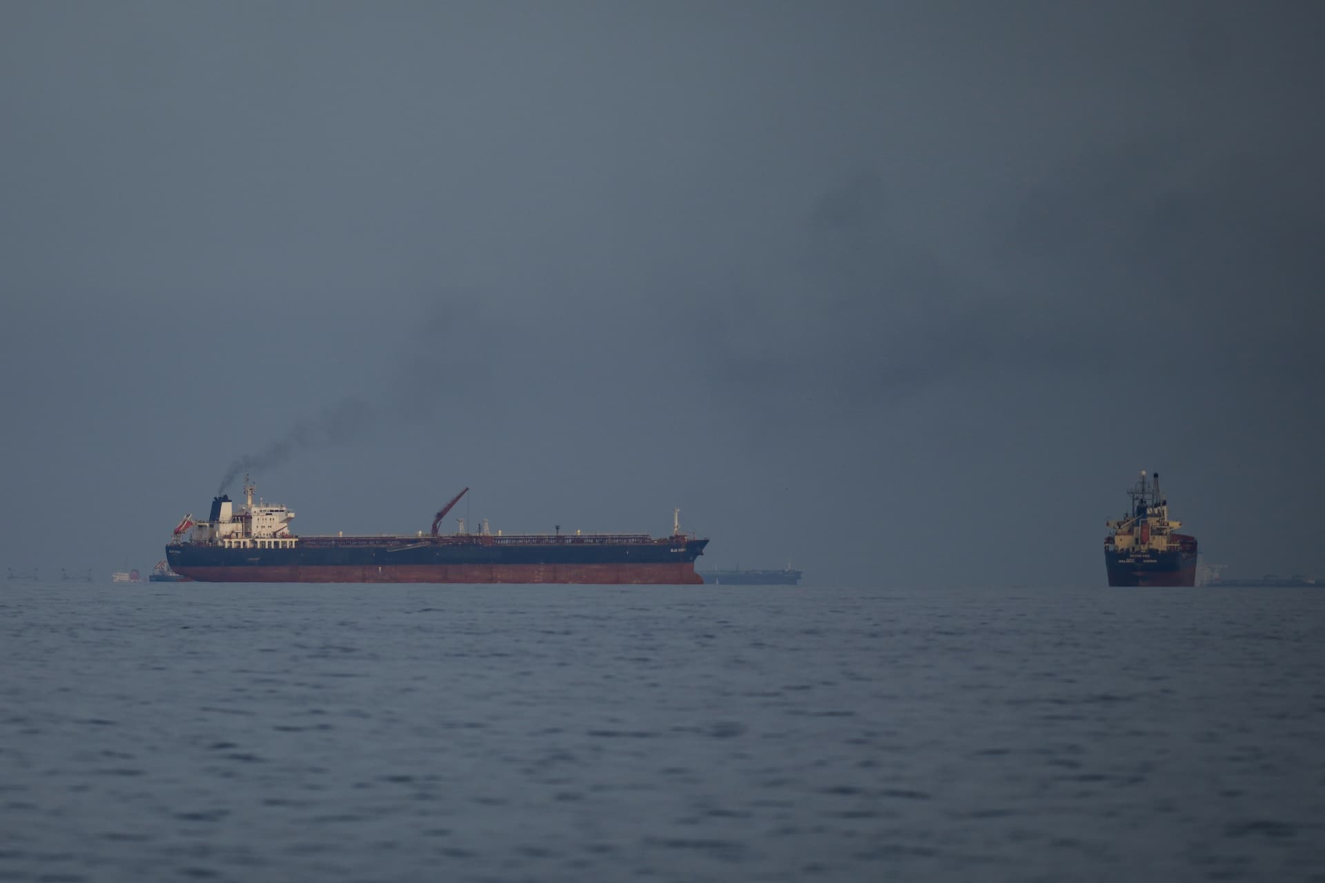 AP/Altaf Qadri Oil tankers and cargo ships in the Strait of Hormuz on March 11, 2026.