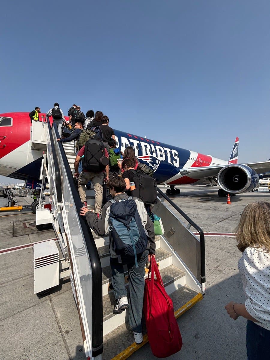 Via X Americans boarding a State Department charter flight heading home from the Middle East.