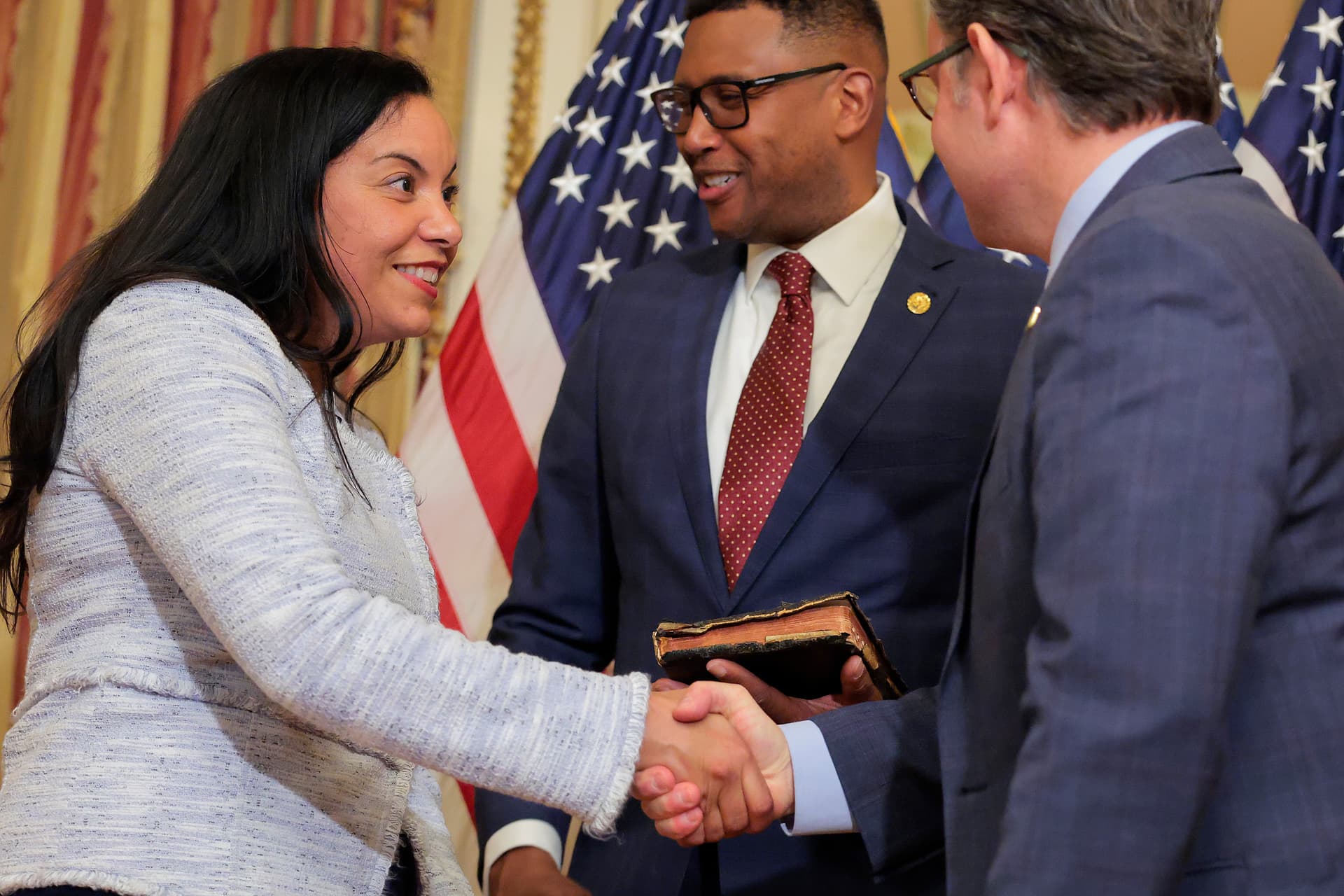 Heather Diehl/Getty Images Congresswoman Analilia Mejia, seen here at her swearing-in at the Capitol on April 20, 2026, is co-sponsoring a bill to boost the federal minimum wage to $15 an hour.