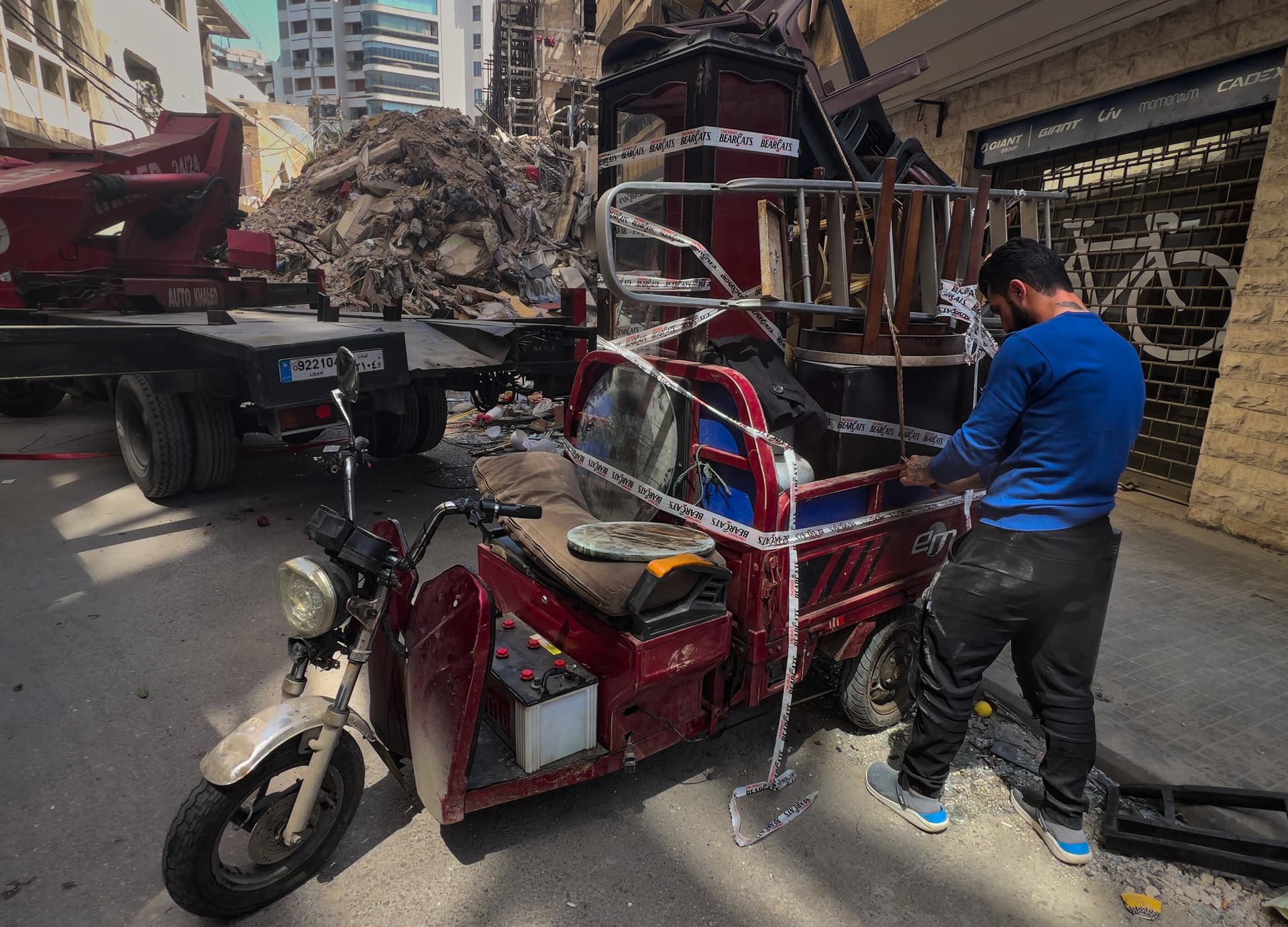 Hussein Malla/AP A worker arranges furniture from an apartment of a destroyed building that was hit a week ago in an Israeli airstrike at central Beirut, Lebanon on April 16, 2026.