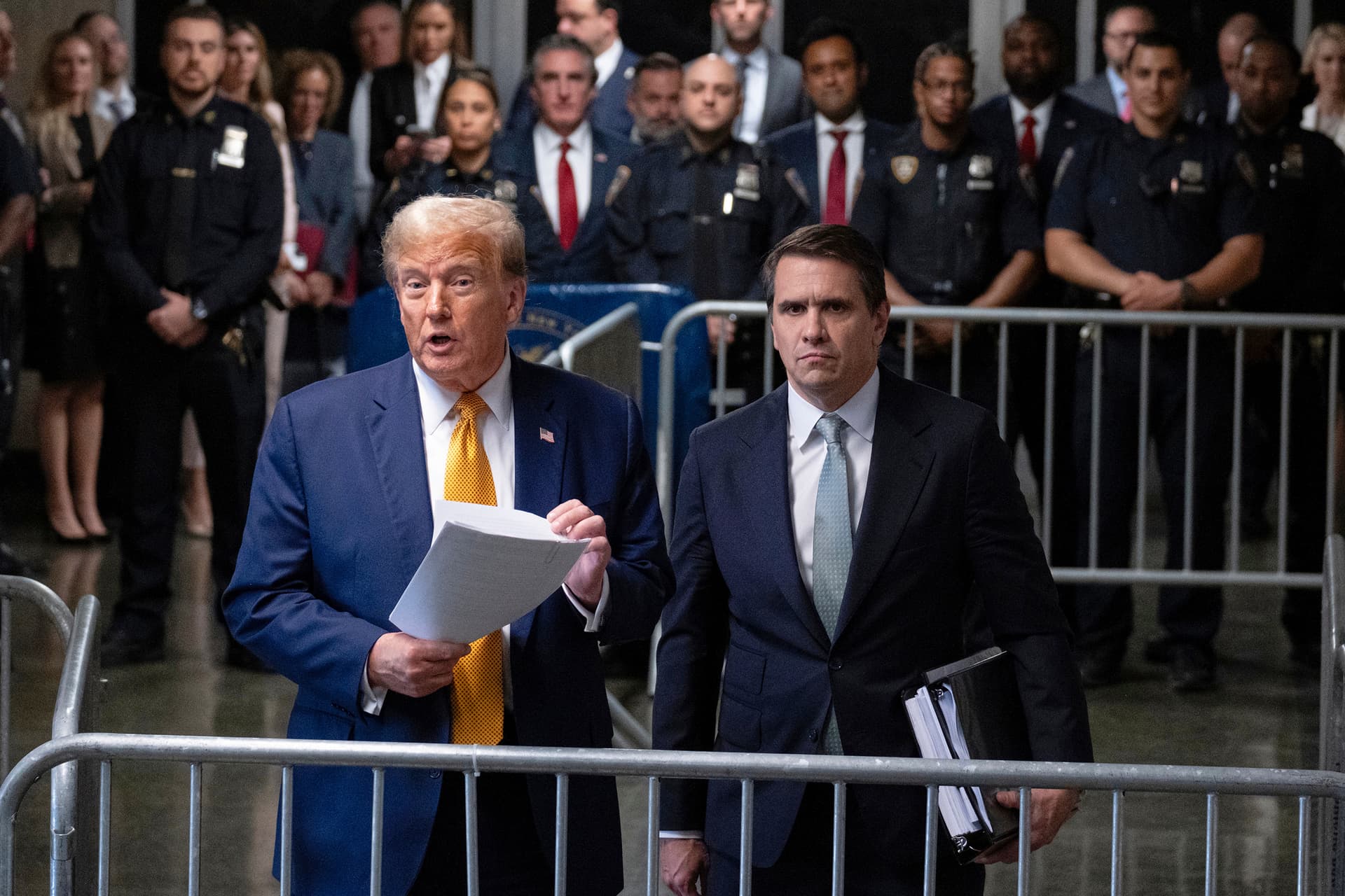 Craig Ruttle/Pool via AP President Trump stands with his then-defense attorney, Todd Blanche, at New York on May 14, 2024.