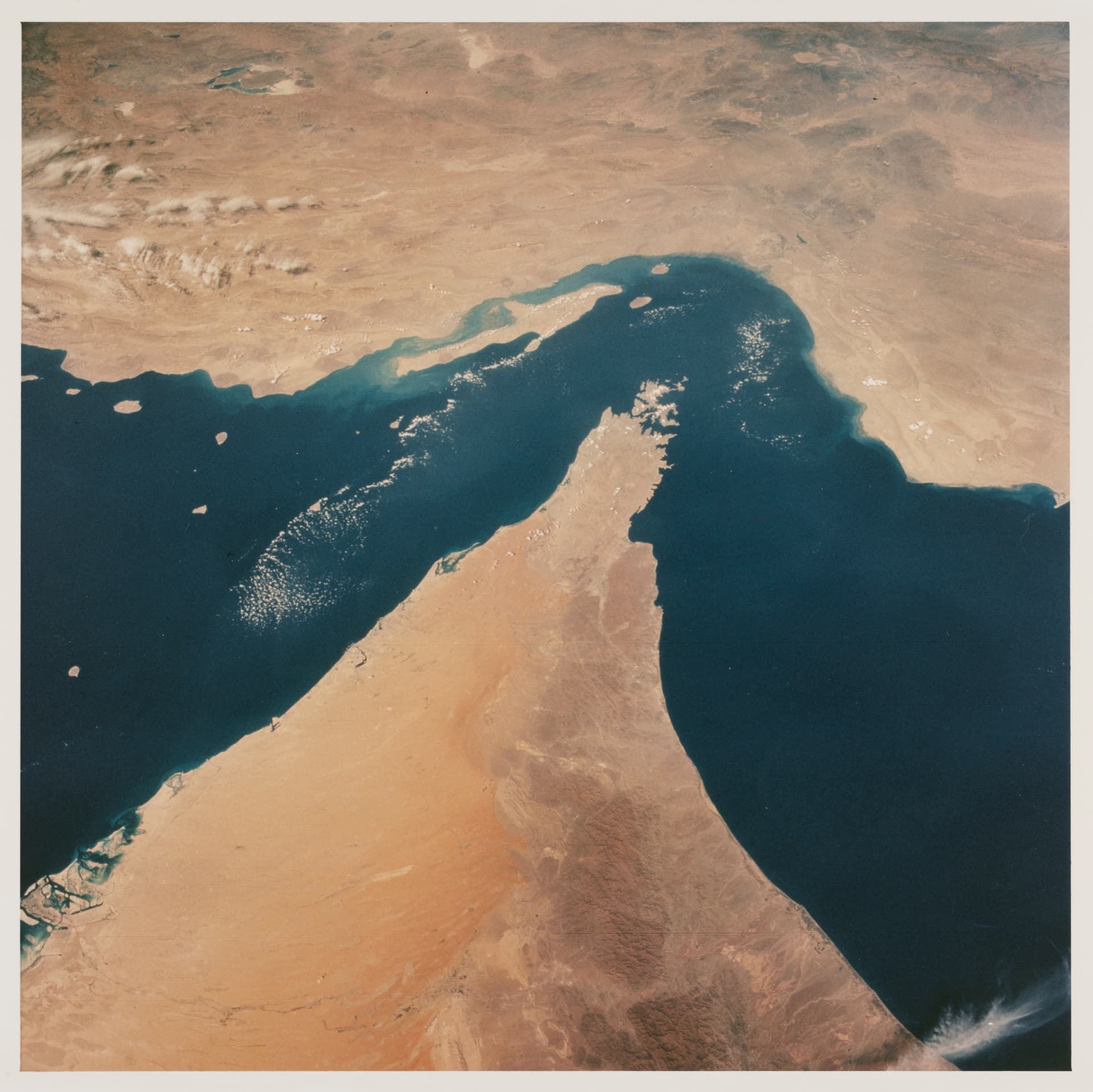 Photo by Space Frontiers/Archive Photos/Hulton Archive/Getty Images View looking north showing the Strait of Hormuz, connecting the Gulf of Oman with the Persian Gulf, with the Zagros Mountains and Qeshm Island of Iran in the background, and areas of Oman, Muscat and the United Arab Emirates in the foreground, as seen from the Space Shuttle Columbia during shuttle mission STS-52 in 1992.