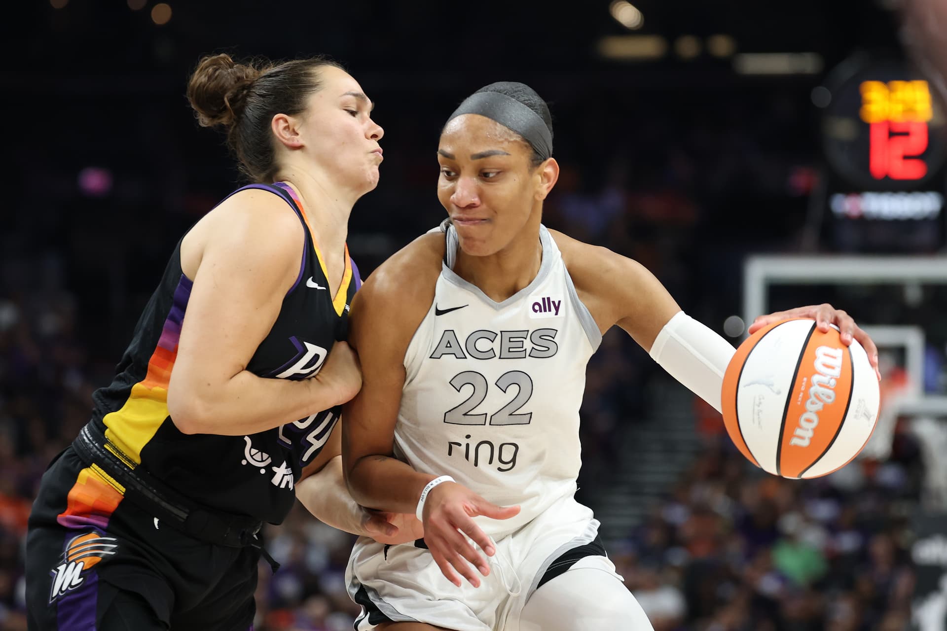 Christian Petersen/Getty Images A'ja Wilson of the Las Vegas Aces drives to the basket against Kathryn Westbeld of the Phoenix Mercury during Game Four of the 2025 WNBA playoffs at Phoenix, Arizona, on October 10, 2025.