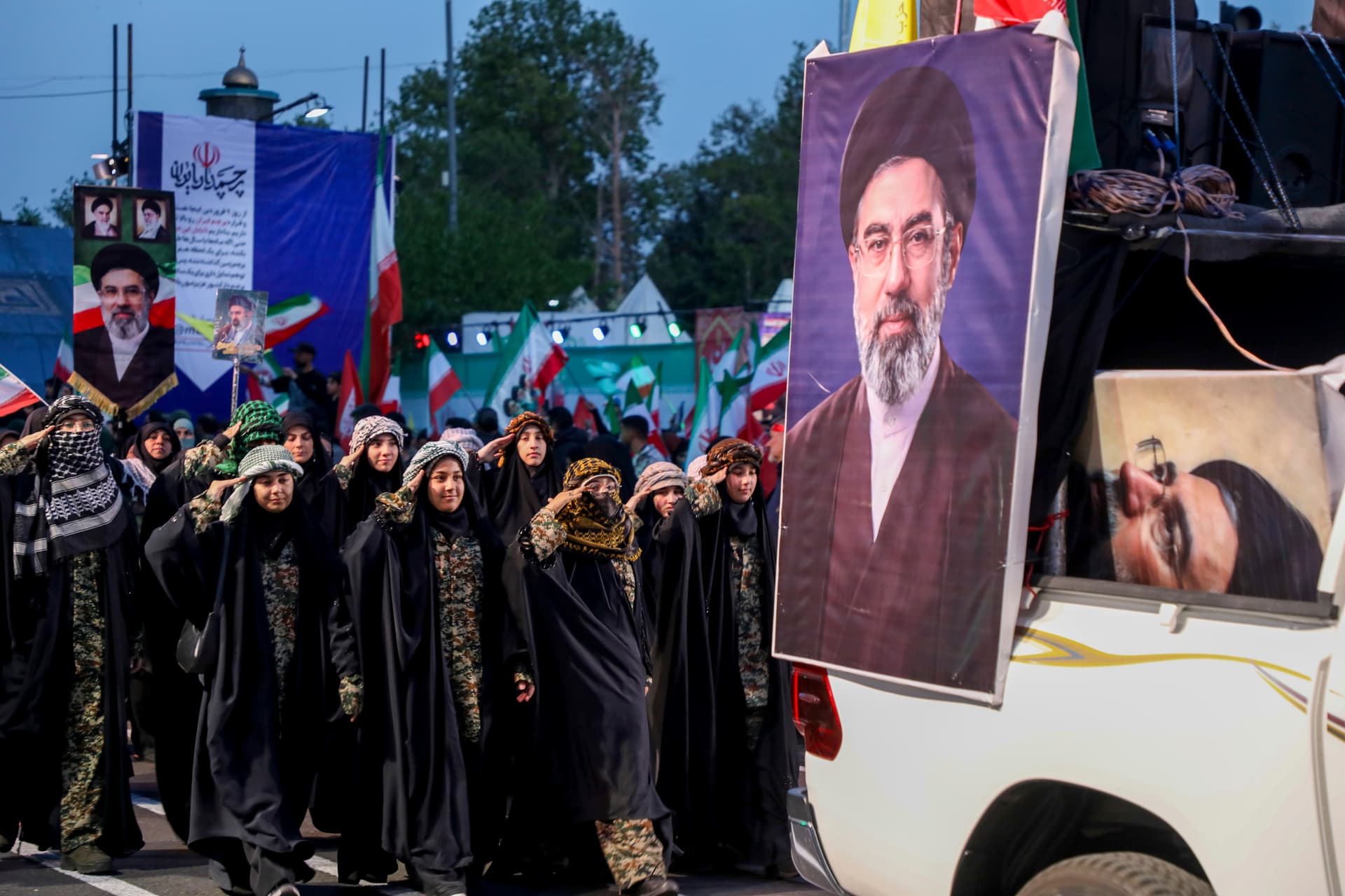 Majid Saeedi/Getty Images Portraits of Iran's supreme leader Ayatollah Mojtaba Khamenei are seen as women salute during a pro-government National Army Day demonstration on April 17, 2026 in Tehran, Iran.