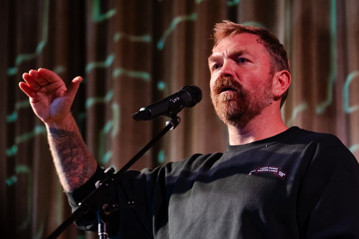 Sophie Park/Getty Images Senate hopeful Graham Platner speaks at a town hall at Ogunquit, Maine, on October 22, 2025.