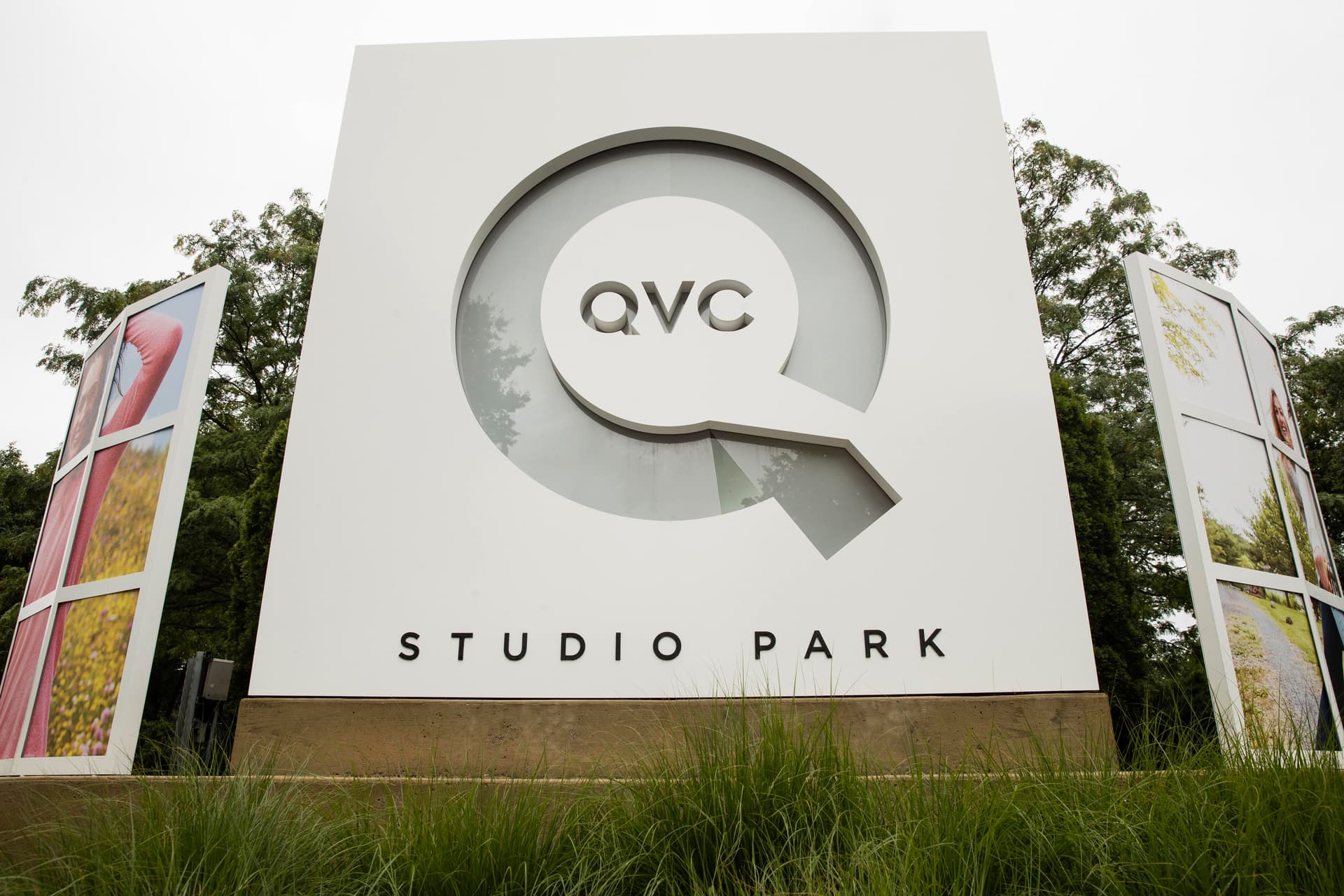 AP/Matt Rourke Corporate signage is shown outside a QVC facility in West Chester, Pennsylvania.