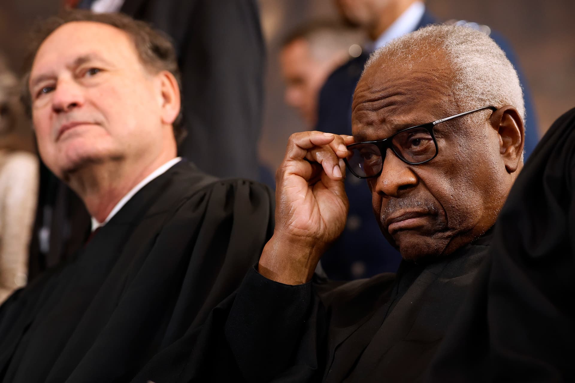 Chip Somodevilla/Getty Images Justices Samuel Alito (L) and Clarence Thomas, seen here at the conclusion of President Trump’s second inauguration on January 20, 2025, both issued strong dissents in a death penalty case that centered on IQ tests.