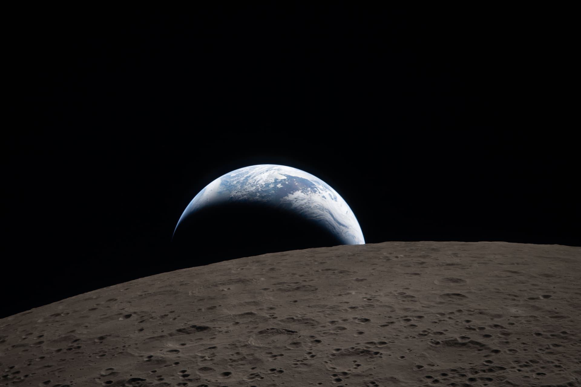 Via NASA Earth captured through the Orion spacecraft window on April 6, 2026, during the Artemis II crew’s flyby of the Moon.