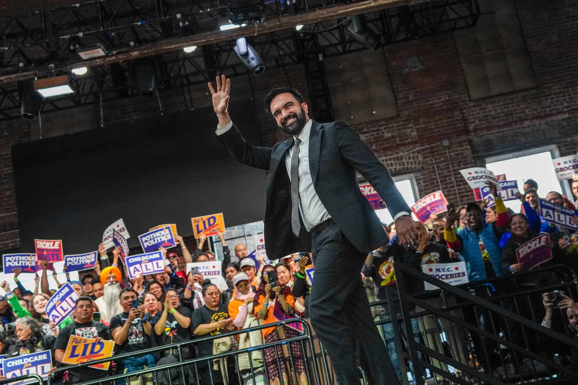 Ryan Murphy/Getty Images Mayor Zohran Mamdani strides on stage for his 100-day address on April 12, 2026.