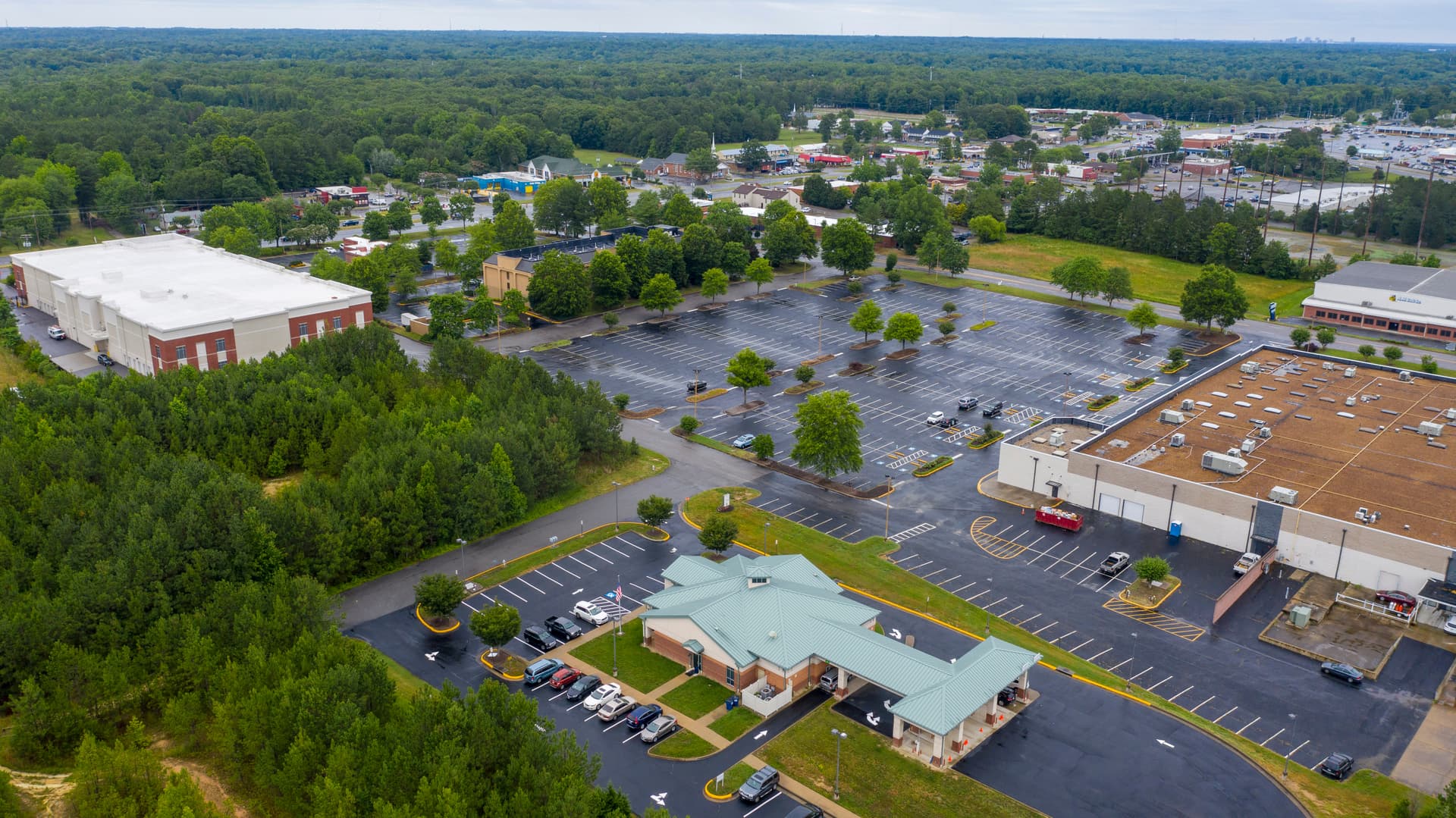 AP/Steve Helber The Call Federal Credit Union, front, a bank robbed in 2019 at Midlothian, Virginia.