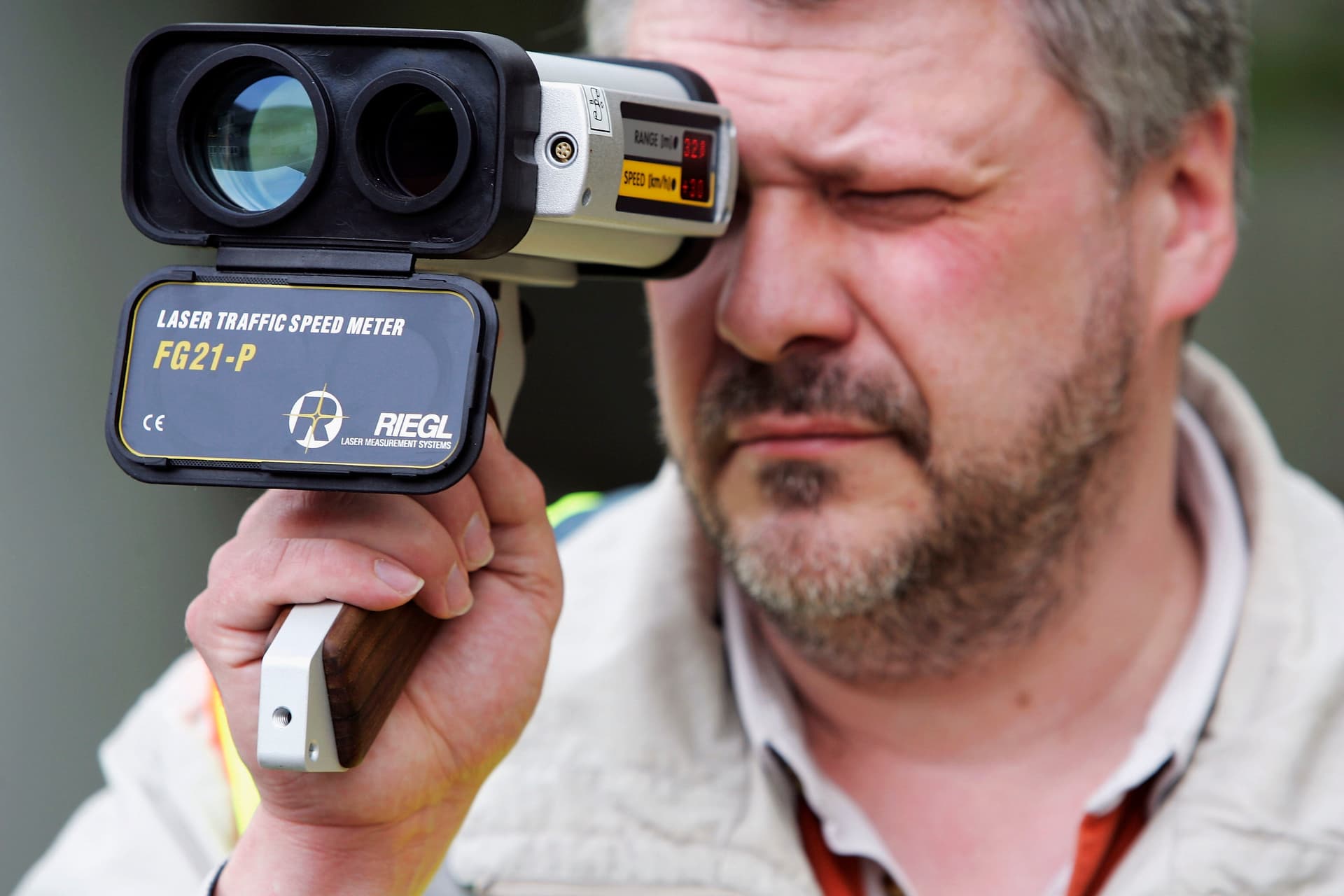 Andreas Rentz/Getty Images A police officer tests a Laser Traffic Speed Meter.
