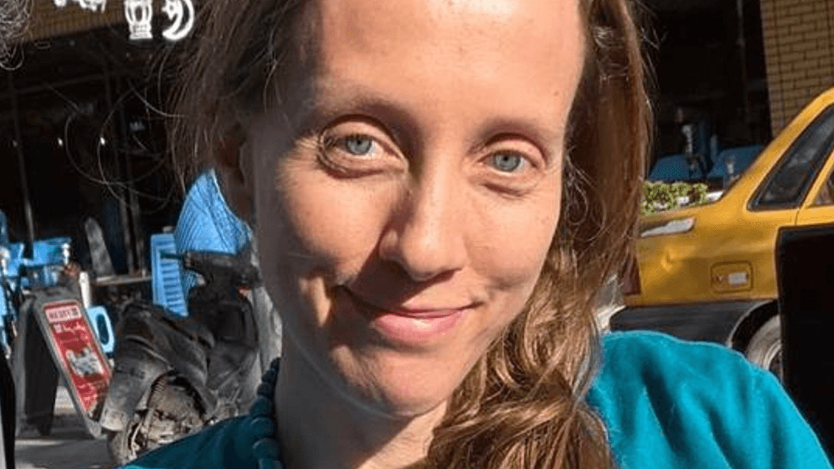 AP Photo American journalist Shelly Kittleson poses for a cellphone photo in a cafe in Baghdad, Iraq, Monday, March 30, 2026.