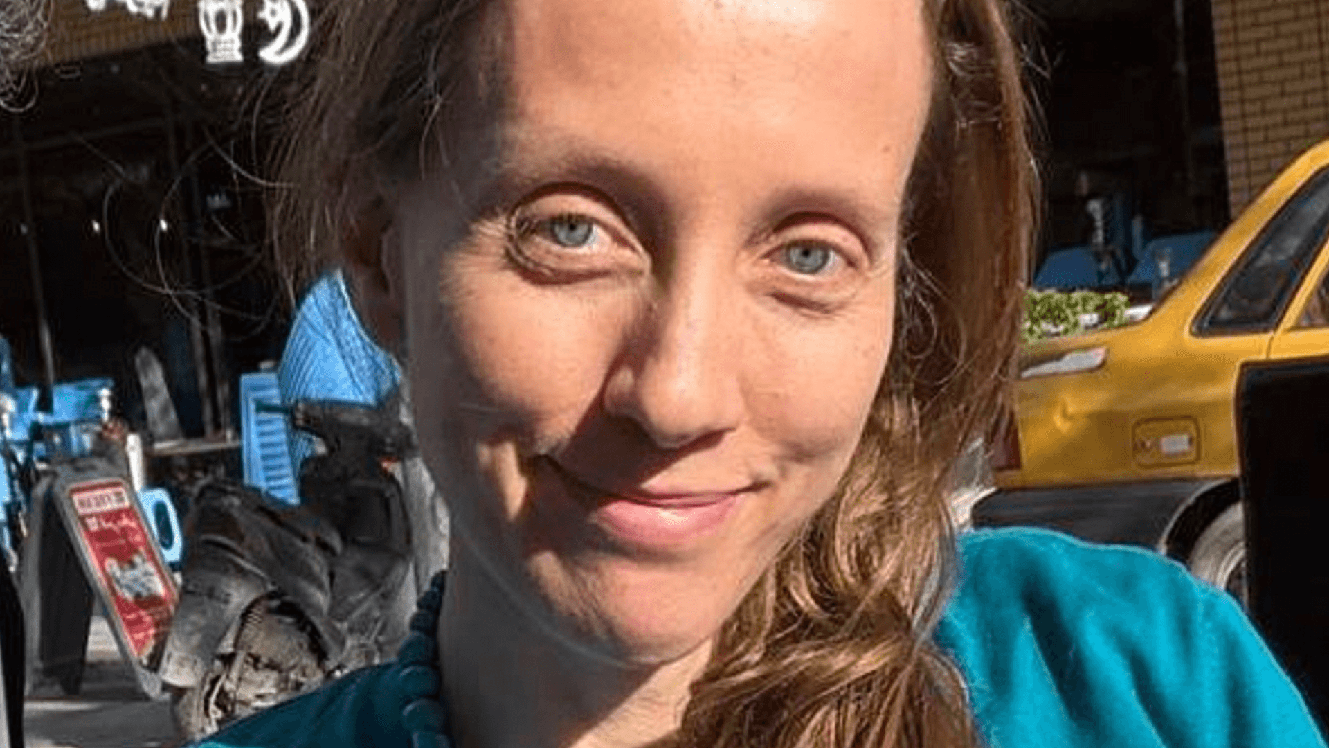 AP Photo American journalist Shelly Kittleson poses for a cellphone photo in a cafe in Baghdad, Iraq, Monday, March 30, 2026.