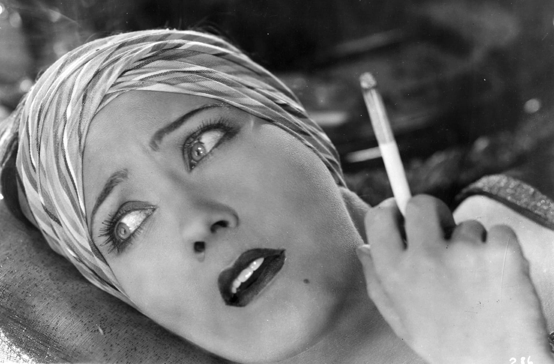 Hulton Archive/Getty Images Gloria Swanson, cigarette in hand.