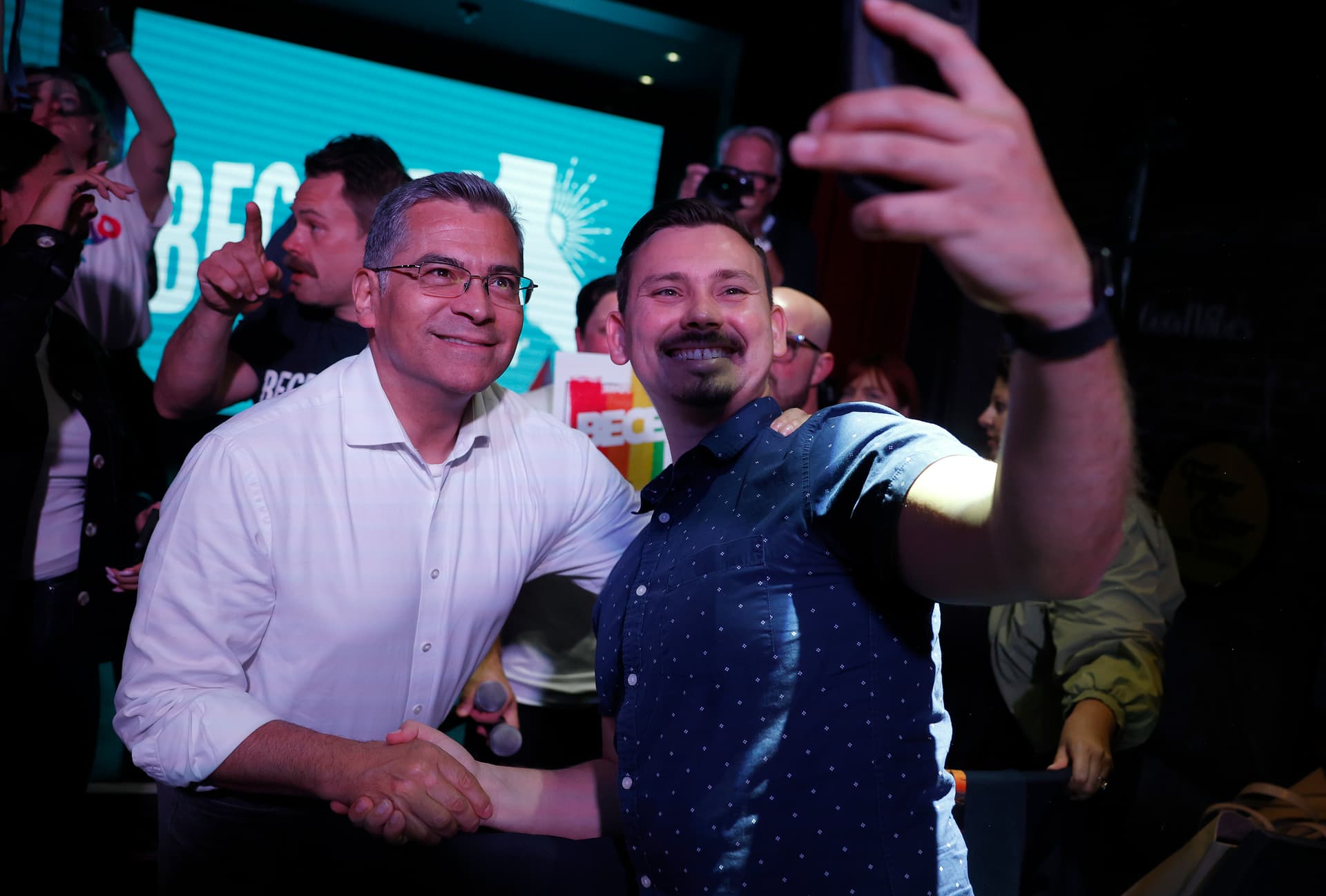 Justin Sullivan/Getty Images California’s front-running gubernatorial candidate, Xavier Becerra, poses for a selfie with a supporter at West Hollywood on May 28, 2026.