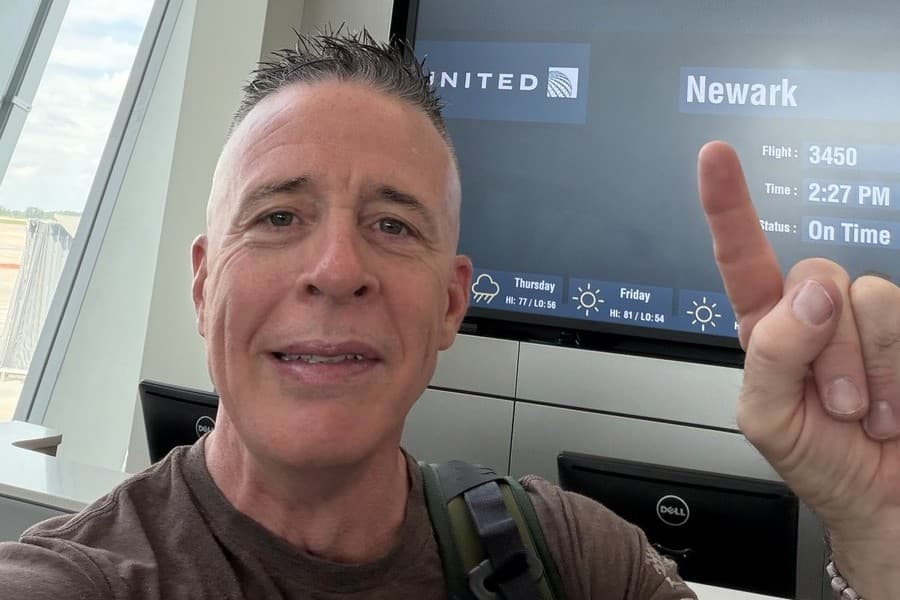 Gregory Bovino via X Former Border Patrol commander-at-large Gregory Bovino points to a departures board showing the next flight to Newark in a post on May 28, 2026.