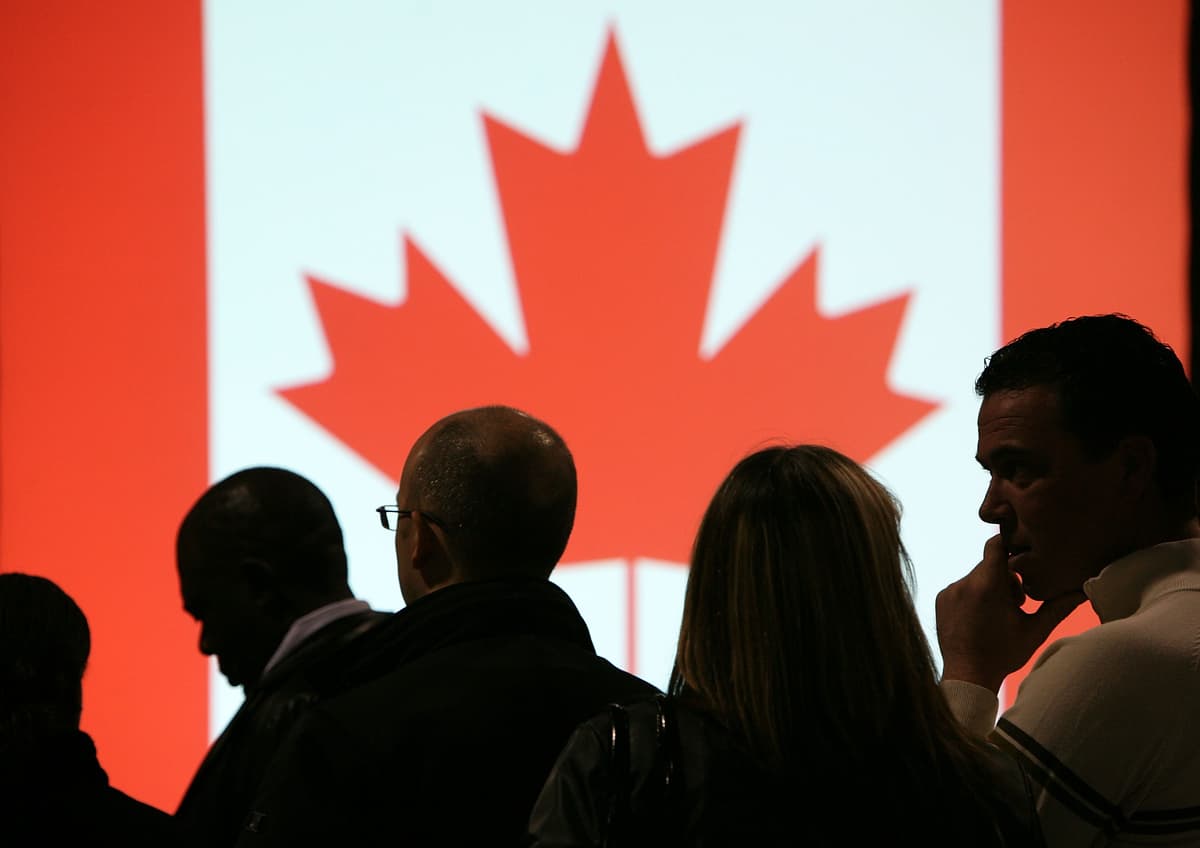 LEEDS, UNITED KINGDOM - NOVEMBER 22: Potential emigrants attend the Opportunities Canada Expo in search of jobs and new lives Canada on November 22, 2008 in Leeds, England. The exhibition by Canadian employers and recruitment consultants gives advice to people seeking work and a new life in Canada or an escape from Britain's financial crisis. The next exhibition and seminar is at London's Earls Court on November 29-30. (Photo by Christopher Furlong/Getty Images) Christopher Furlong/Getty Images