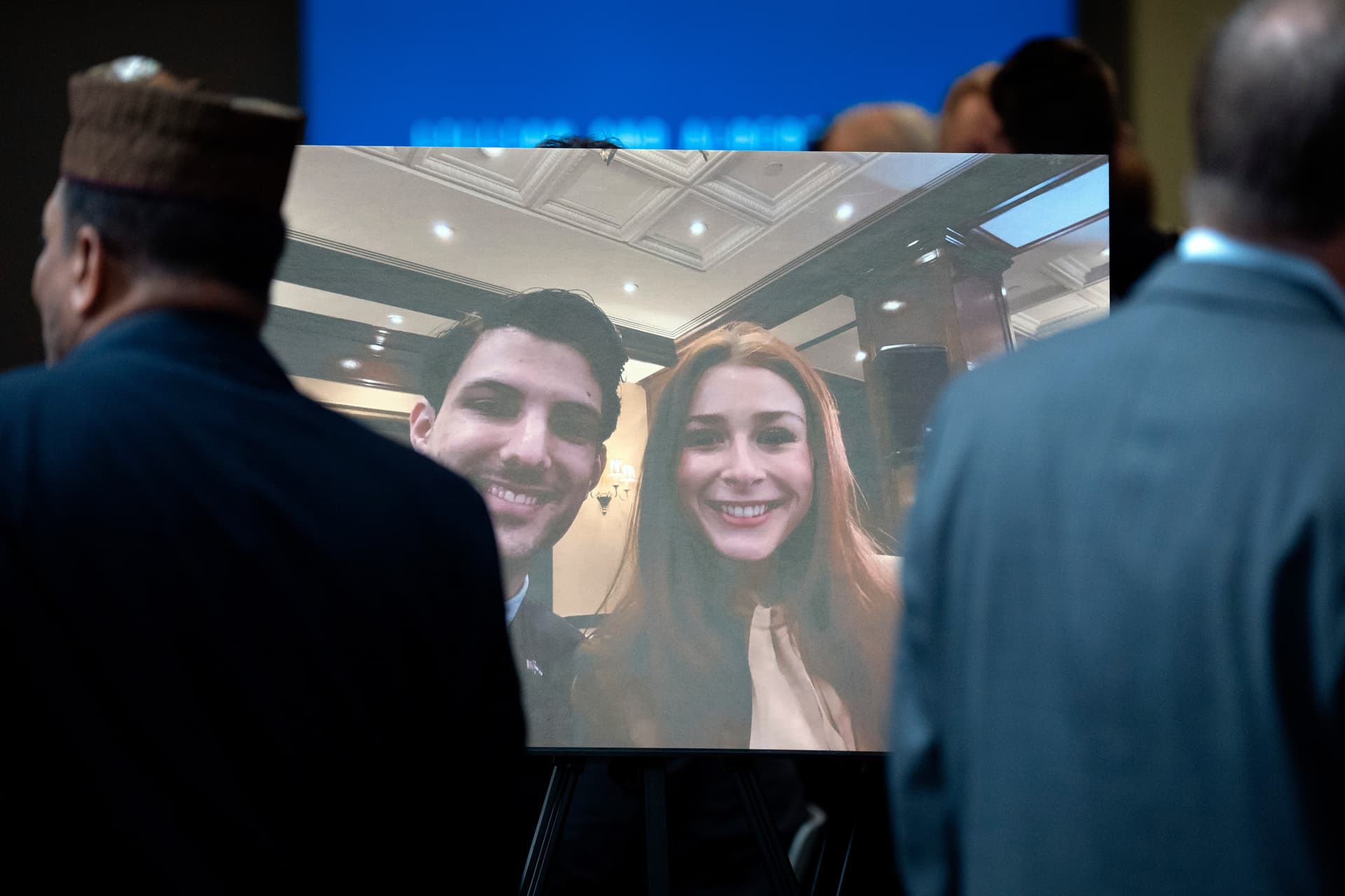 Mark Schiefelbein/AP Visitors pass a photo of slain Israeli Embassy staff members Yaron Lischinsky, left, and Sarah Milgrim before a service to mark the reopening of the Capital Jewish Museum at Washington, D.C. on May 29, 2025.