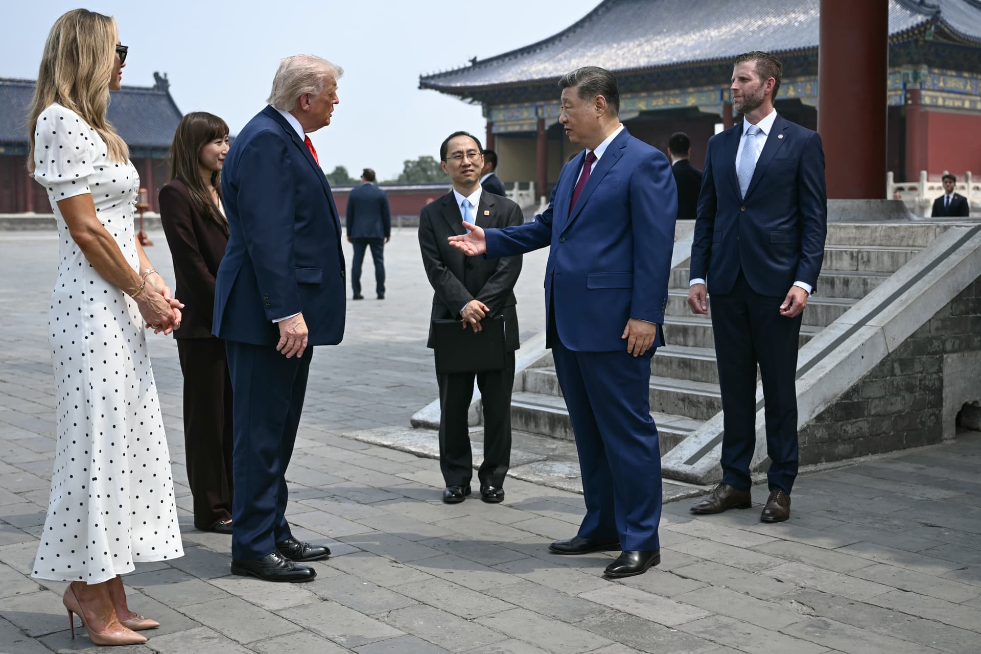 Brendan Smialowski/Pool via Getty Images Eric Trump, far right, and his spouse Lara look on as Presidents Trump and Xi Jinping speak during a visit to the Temple of Heaven at Beijing on May 14, 2026.