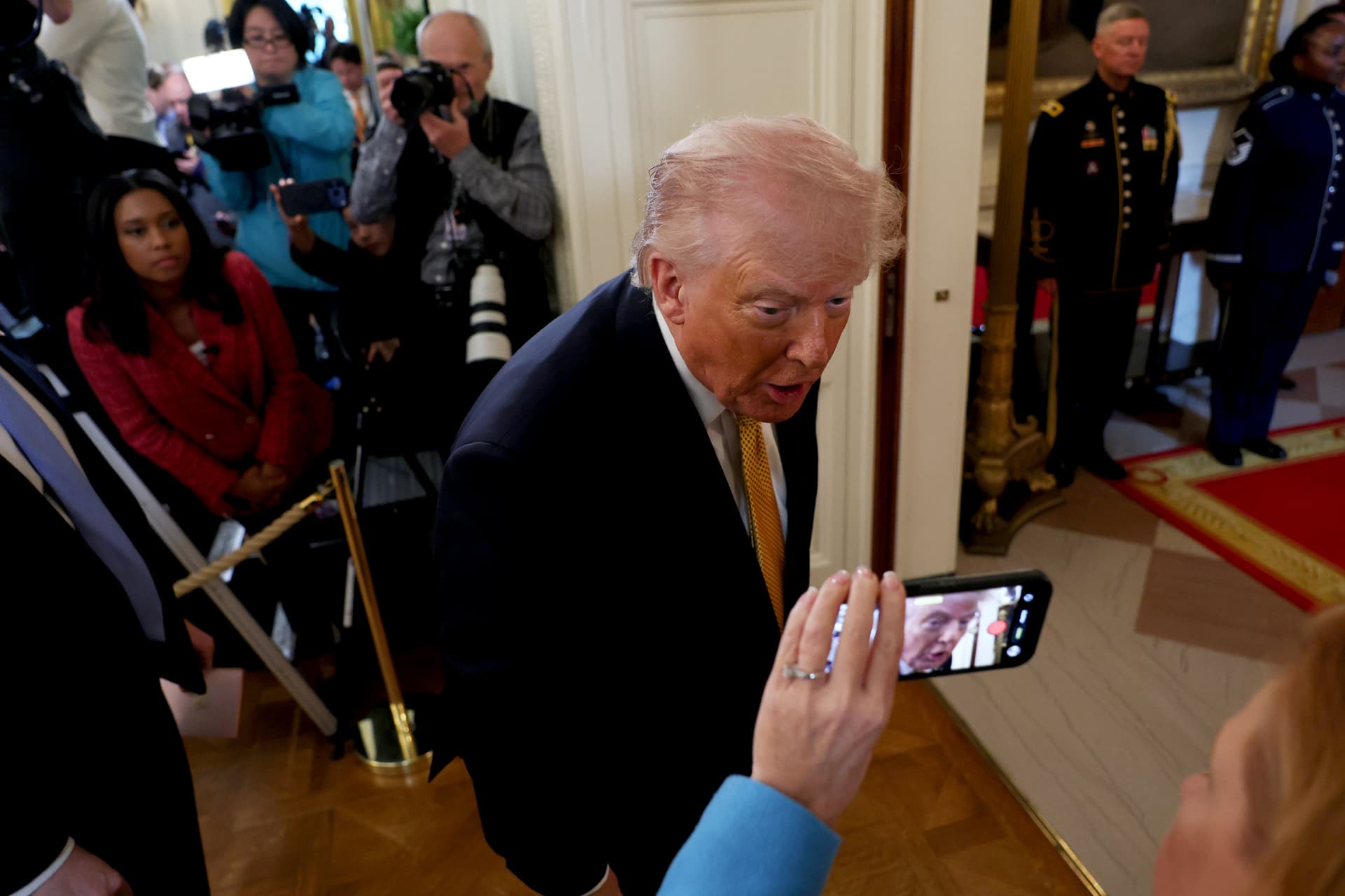 Anna Moneymaker/Getty Images President Trump departs the East Room of the White House on May 6, 2026.