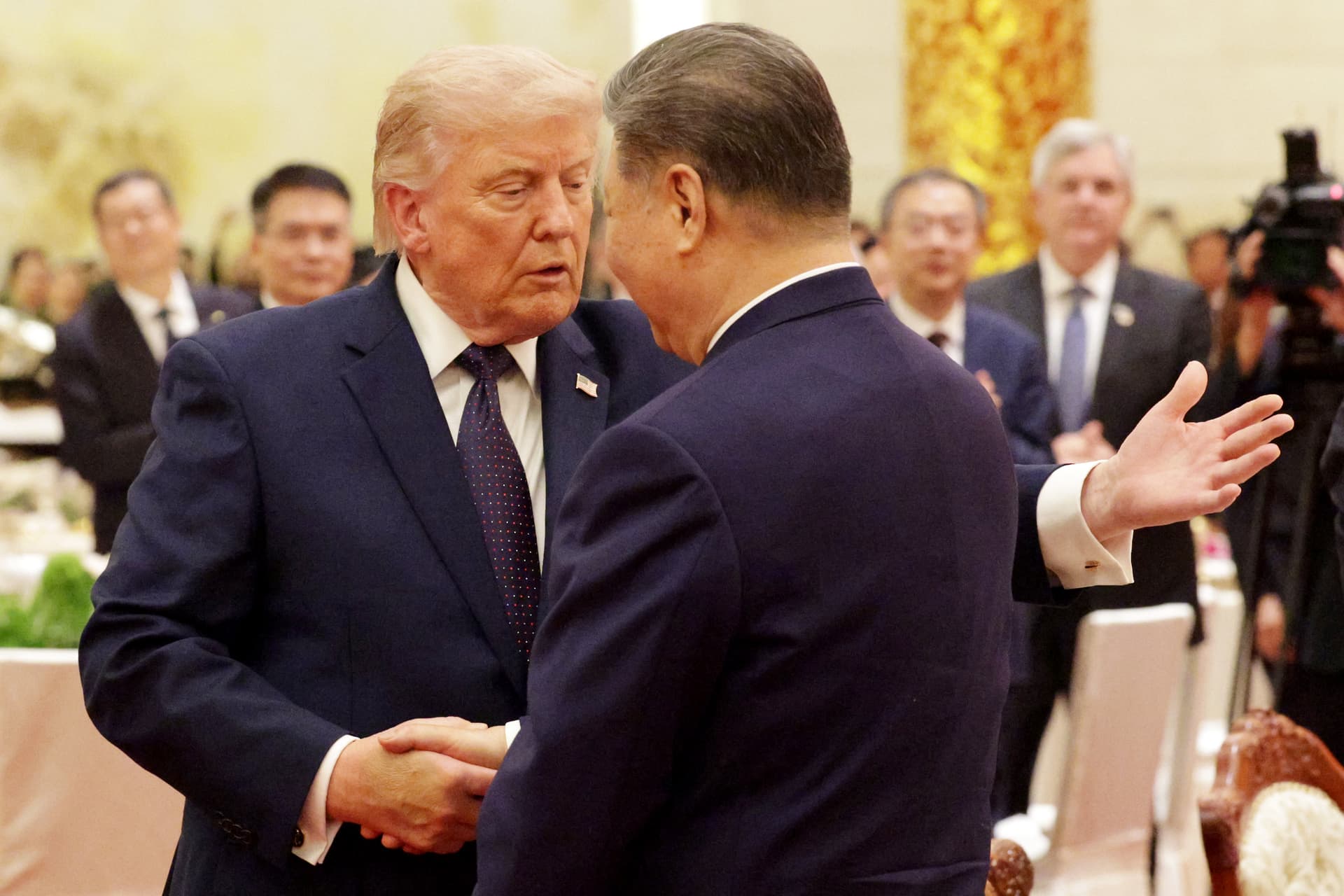 Alex Wong/Getty Images President Trump shakes hands with President Xi Jinping during a state banquet at the Great Hall of the People on May 14, 2026 at Beijing.