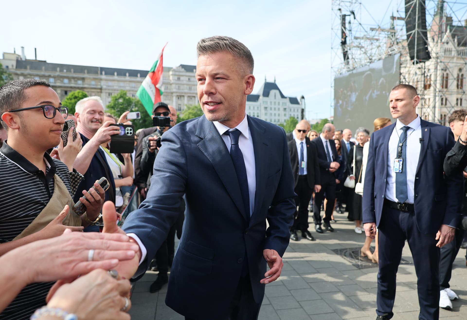 John Moore/Getty Images Prime Minister Peter Magyar of Hungary greets supporters outside the parliament building where he was sworn in at Budapest on May 9, 2026.