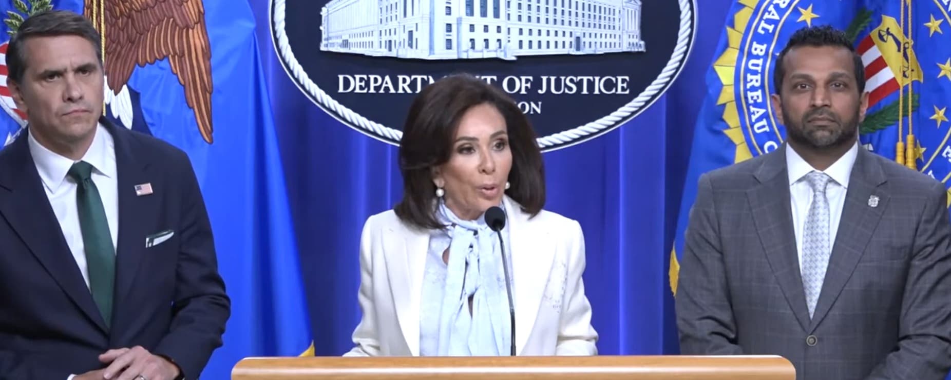 Justice.gov via YouTube A screengrab from the press conference in which Acting Attorney General Todd Blanche, FBI Director Kash Patel, and U.S. Attorney Jeanine Pirro announced federal charges on April 27, 2026, against the alleged gunman at the White House Correspondents Dinner.