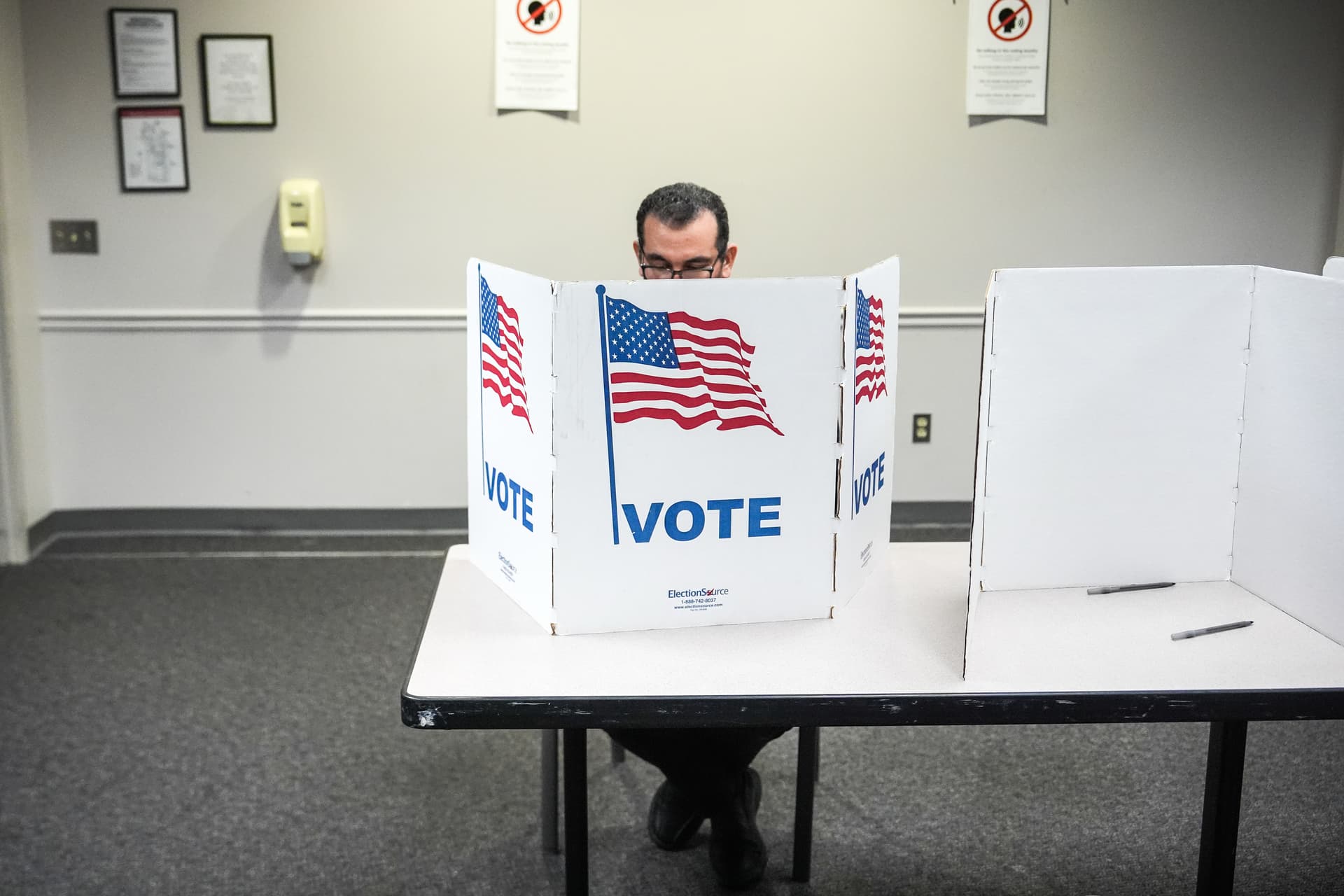 Julia Demaree Nikhinson/AP A voter fills out his ballot in the Virginia redistricting referendum at Fairfax, Virginia, on April 21, 2026.
