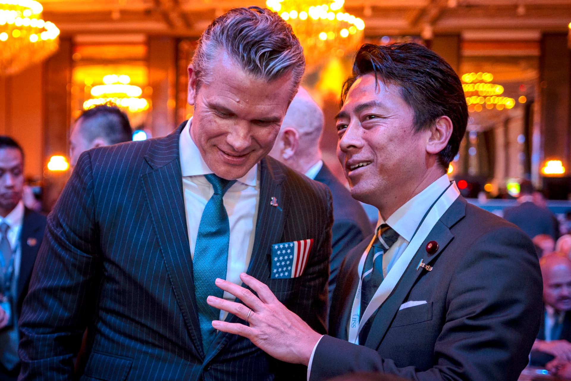 Ezra Acayan/Getty Images Secretary of Defense Pete Hegseth speaks with Defense Minister Koizumi Shinjiro of Japan during the opening dinner of the 23rd IISS Shangri-La Dialogue at the Shangri-La Hotel on May 29, 2026, at Singapore.