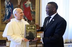 Brandon Johnson via X Mayor Brandon Johnson of Chicago presents Pope Leo XIV with a key to the Illinois city of his birth during a visit to the Vatican on May 28, 2026.
