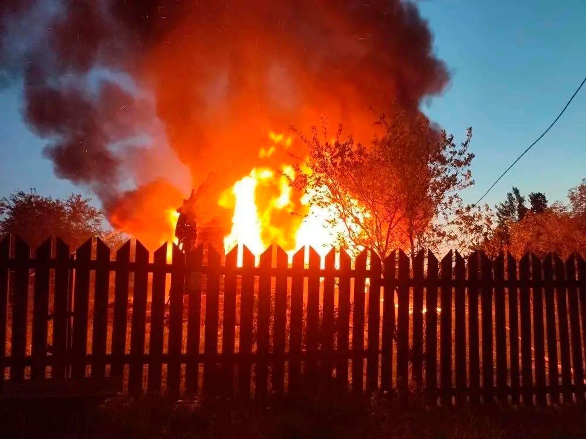 Governor Andrei Vorobyev of Moscow region's official telegram channel via AP A house on fire after a Ukrainian attack at Khimki, just outside Moscow, Russia, on May 17, 2026.