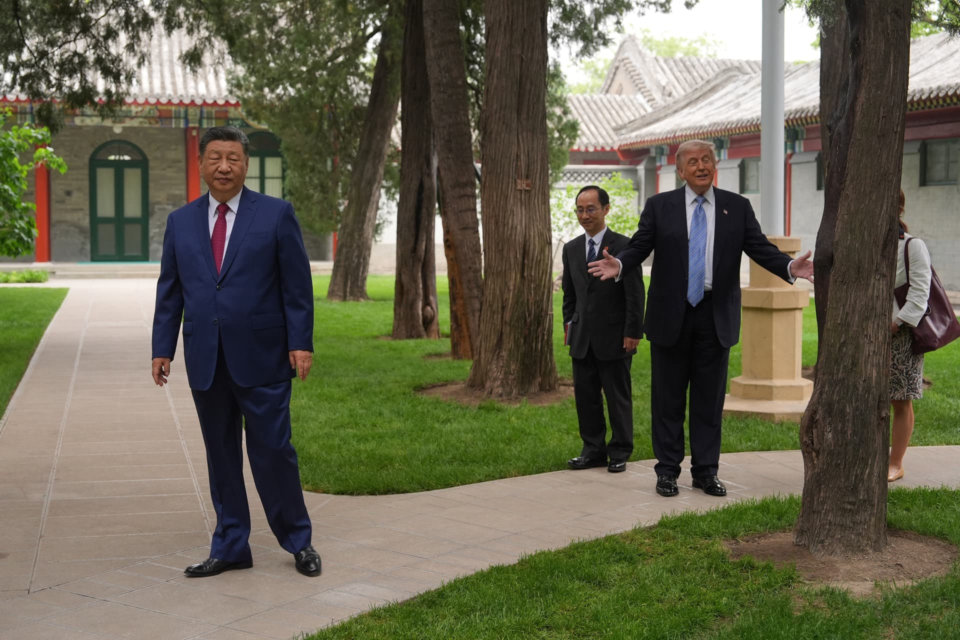 AP/Mark Schiefelbein, pool President Trump walks with President Xi Jinping at the Zhongnanhai leadership compound, May 15, 2026, Beijing.